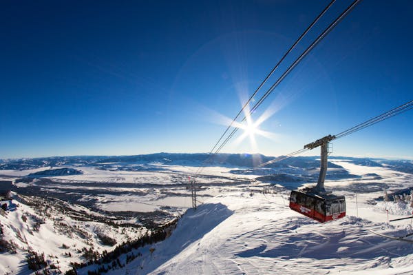 100 people can fit in "Big Red," the aerial tram that takes folks 4,139 vertical feet from Teton Village to the summit of Rendezvous Mountain, where y