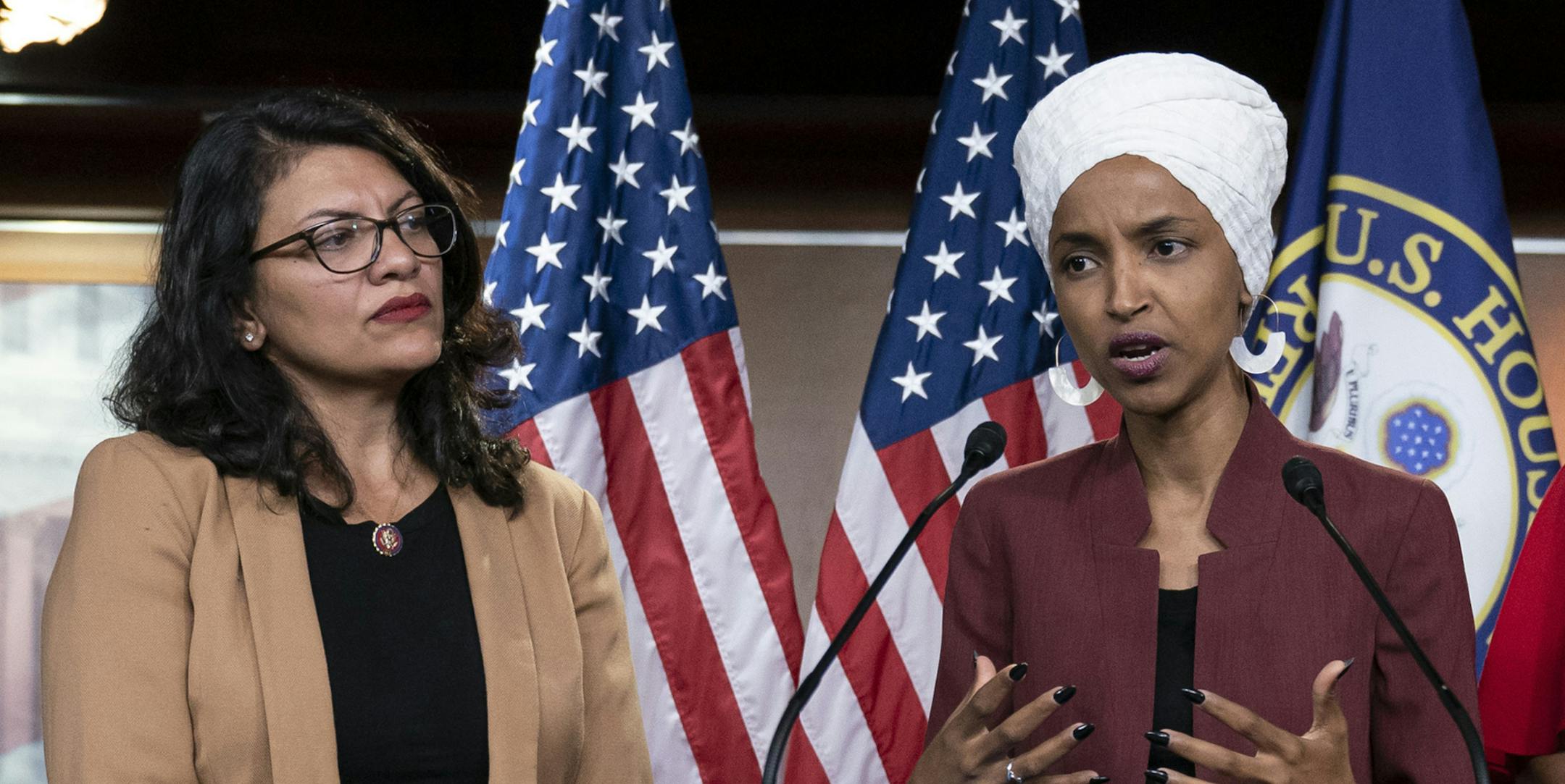 FILE - In this July 15, 2019, file photo, U.S. Rep. Ilhan Omar, D-Minn, right, speaks, as U.S. Rep. Rashida Tlaib, D-Mich. listens, during a news conference at the Capitol in Washington. In the eyes of critics, Benjamin Netanyahu’s decision to bar two Democratic congresswomen at the request of President Donald Trump is the latest reckless gamble by a prime minister willing to sacrifice Israel’s national interests for short-term gain. And yet the pursuit of such allegedly short-term