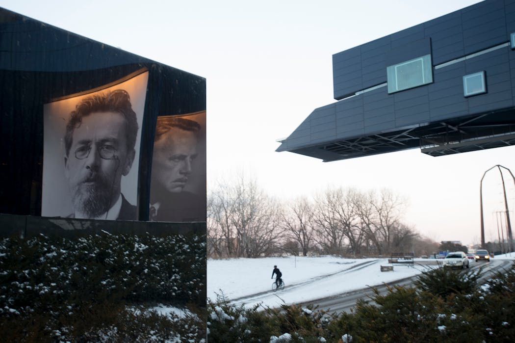 A bicyclist traveled on West River Parkway beside the Guthrie Theater near downtown Minneapolis in 2015.