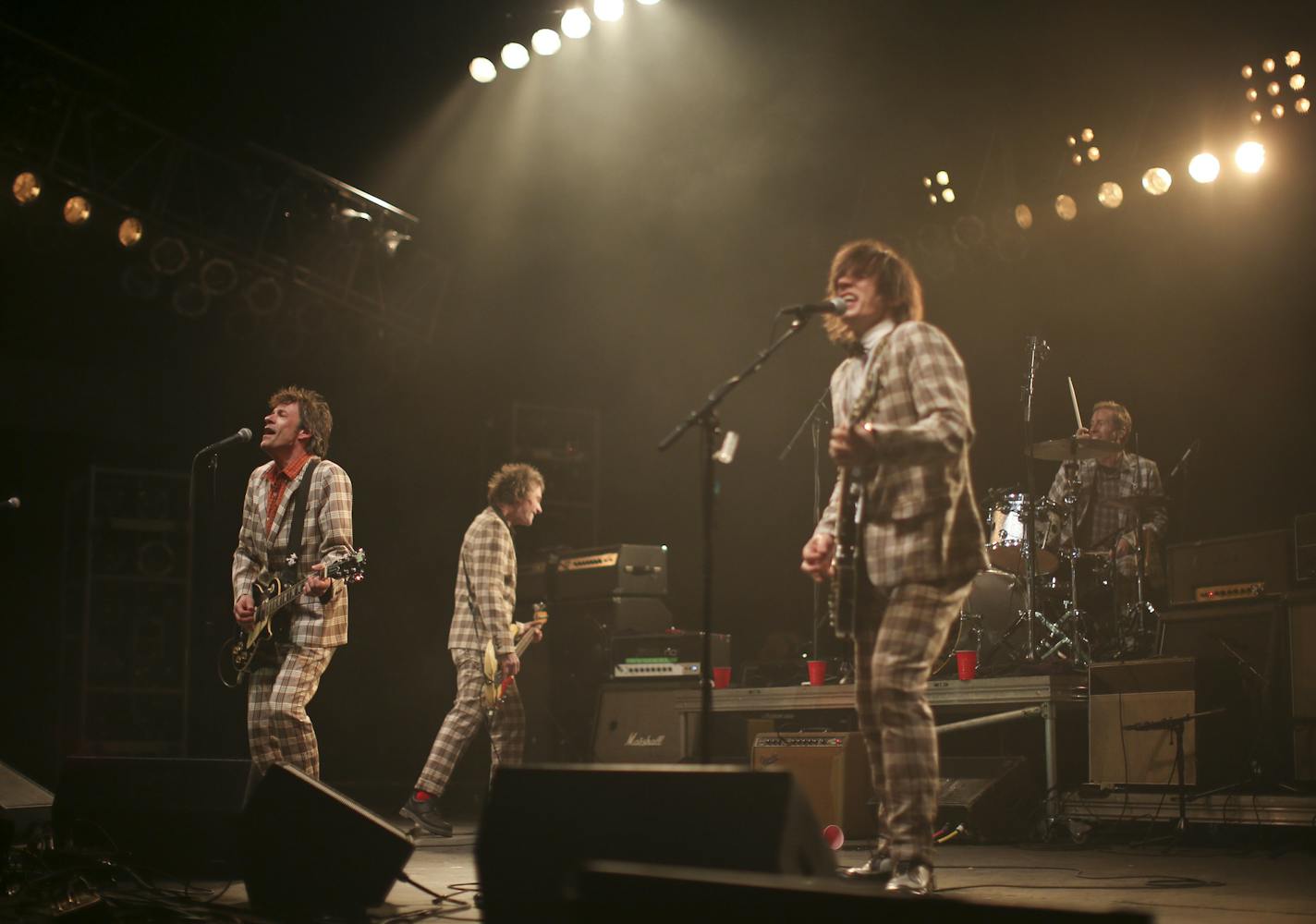 The Replacements during their set at Midway Stadium Saturday evening. From left were founding members Paul Westerberg, Tommy Stinson, with replacement members David Minehan on guitar and drummer Josh Freese. ] JEFF WHEELER &#x201a;&#xc4;&#xa2; jeff.wheeler@startribune.com The Replacements reunion tour finally made a stop in their hometown Saturday night, September 13, 2014 at Midway Stadium in St. Paul.