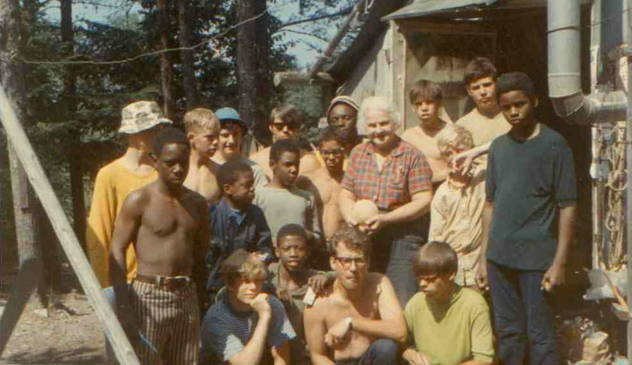 Image from Urban Ventures canoe trip in the Boundary Waters Canoe Area Wilderness. Dorothy Molter is standing to the right.