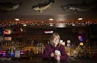 Toni Thuringer, co-owner of the Haven Bar in Babbitt, Minn., is among the local business owners supporting the mine. Her bar is right along the road t
