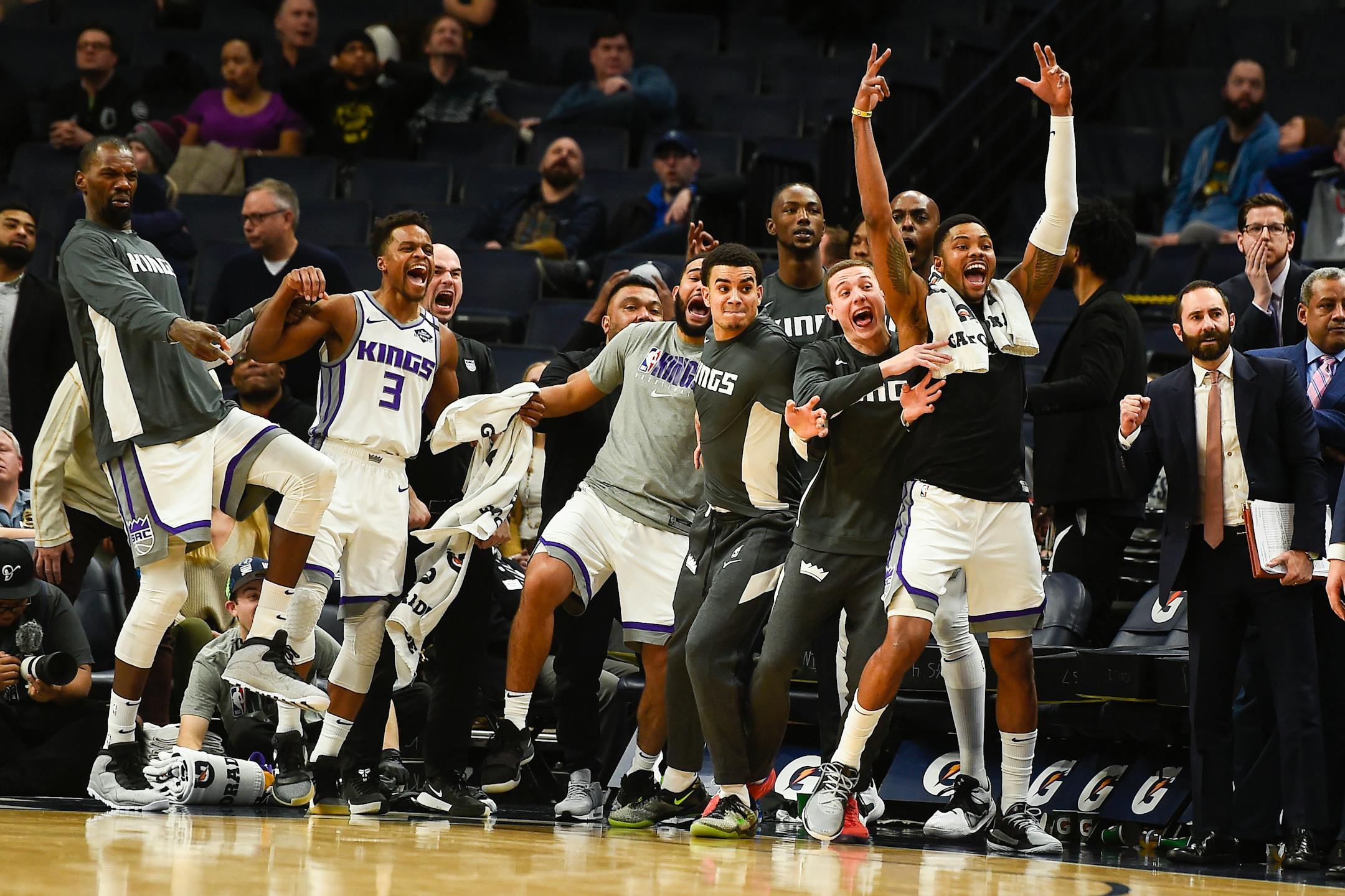 The Sacramento bench players reacted after Kings guard Bogdan Bogdanovic made a jump shot to take an improbable lead in overtime against the Timberwolves at Target Center on Monday night.