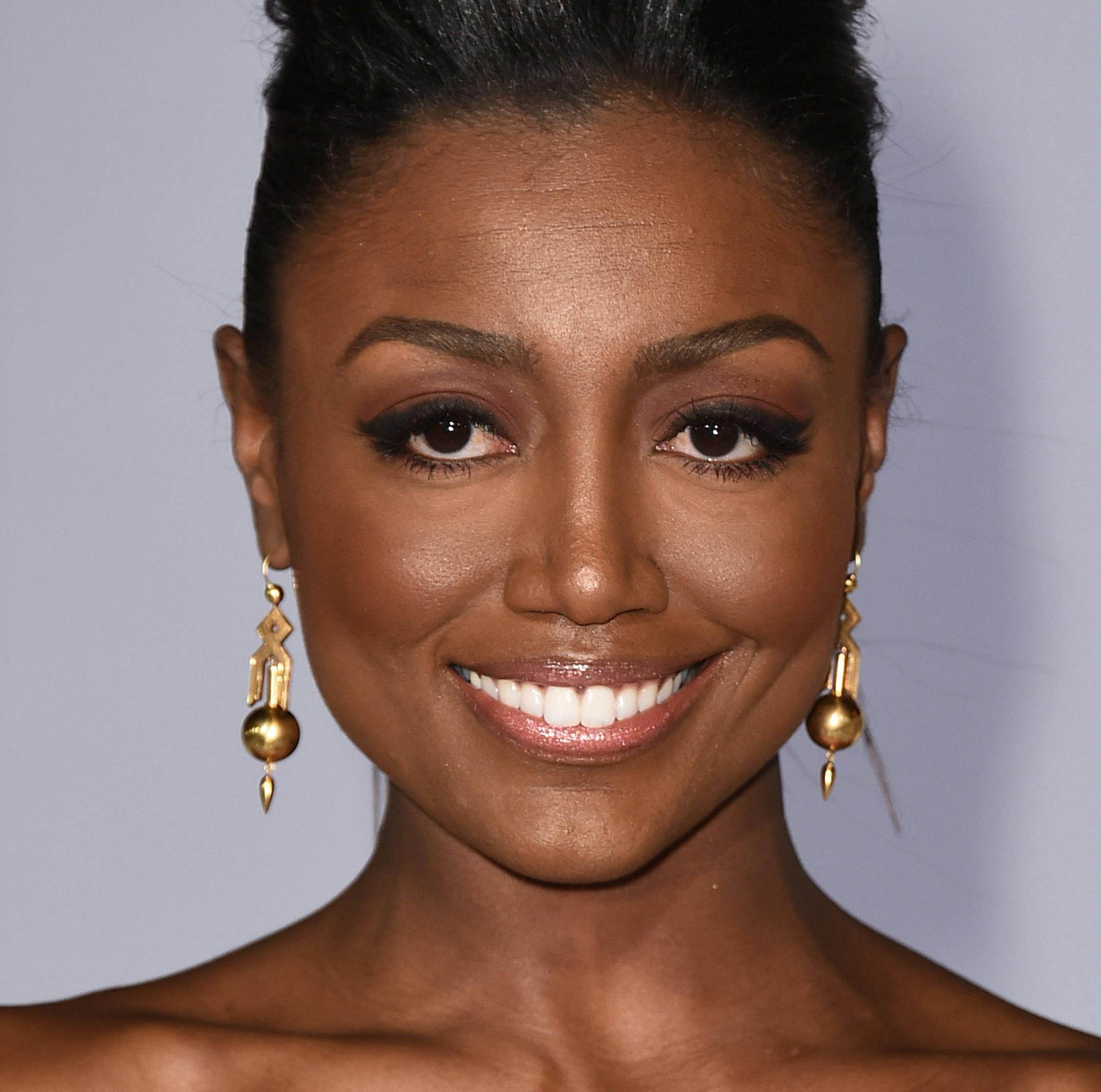 Patina Miller arrives at the Los Angeles premiere of "The Hunger Games: Mockingjay - Part 1" at the Nokia Theatre L.A. Live on Monday, Nov. 17, 2014. (Photo by Jordan Strauss/Invision/AP) ORG XMIT: INVW