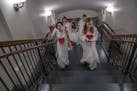 Supporters of a child marriage ban made their way to the State Capitol rotunda Thursday, Feb. 13 in St. Paul. Sen. Sandy Pappas and Rep. Kaohly Her un