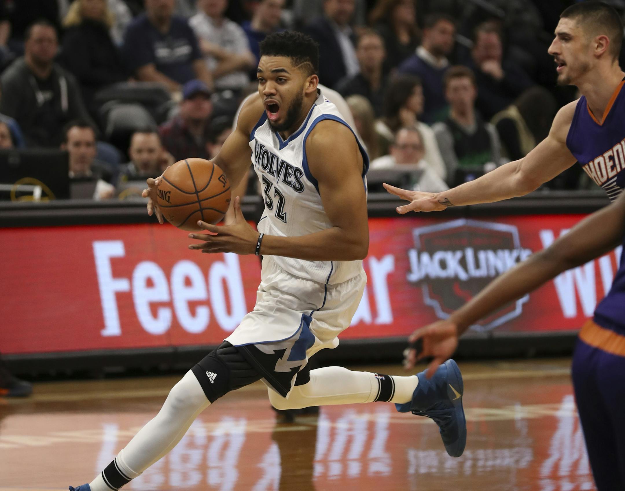 Karl-Anthony Towns scored 28 points for the Timberwolves, making two key plays late to help beat the Suns on Monday.
