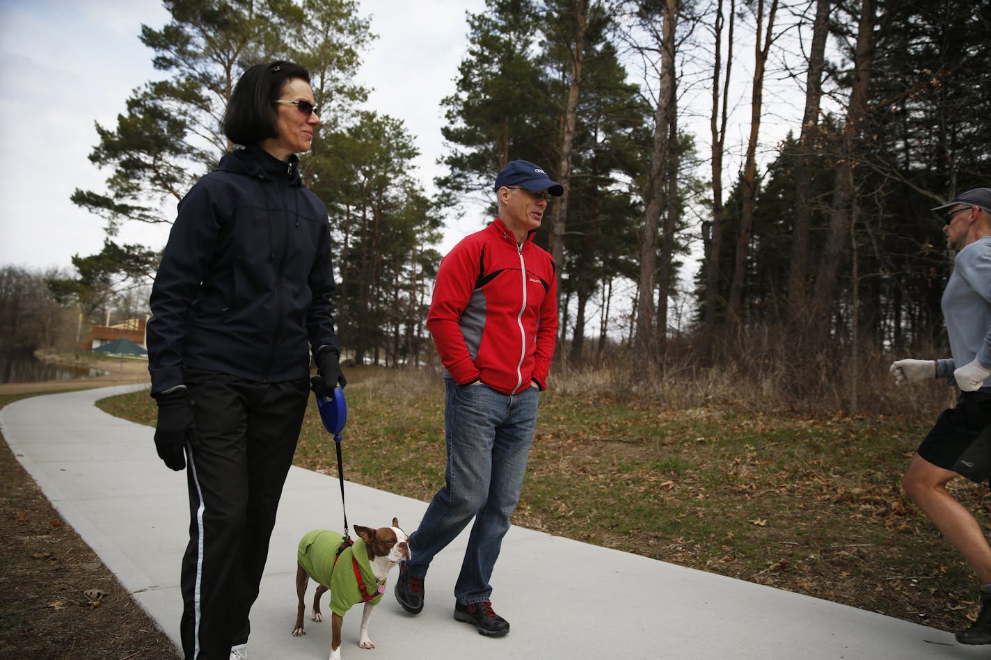 At the Lebanon Hills Regional Park, Jinny and Mike Berkopec were walking their dog Olive on a paved loop section of the park. The two are avid cross country skiers who feel that most of the park should be left unpaved. ]rtsong-taatarii@startribune.com