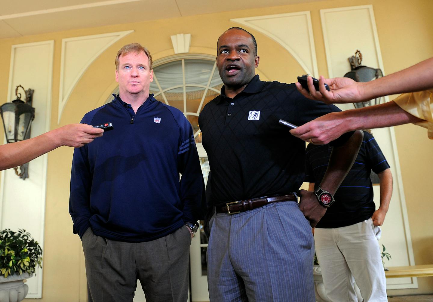 NFL commissioner Roger Goodell, left, and National Football League Players Association executive director DeMaurice Smith, right, speak to the media outside of the Ritz-Carlton hotel after addressing players during the NFLPA rookie symposium on Wednesday, June 29, 2011 in Sarasota, Fla. (AP Photo/Brian Blanco)