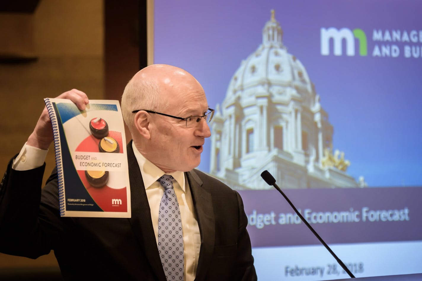 Management and Budget Commissioner Myron Frans presented the February budget forecast which projected a $329 million budget surplus for the 2018-19 biennium.