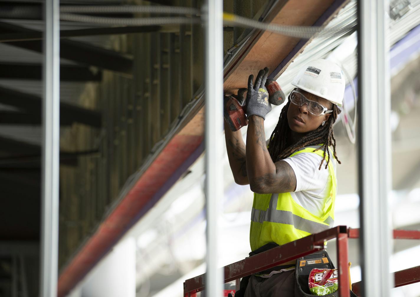 Carmen Richardson, a carpenter with M.A. Mortenson Co. for the past eight years, fitted a board before securing it with screws to the piece behind it while working at Allianz Stadium this week. ] JEFF WHEELER &#xef; jeff.wheeler@startribune.com M.A. Mortenson Co. and other construction companies' efforts to increase gender and ethnic diversity in the workplace in the wake of the #metoo and other movements. Workers at the Allianz Stadium work site were photographed Monday, June 4, 2018 in St. Pau