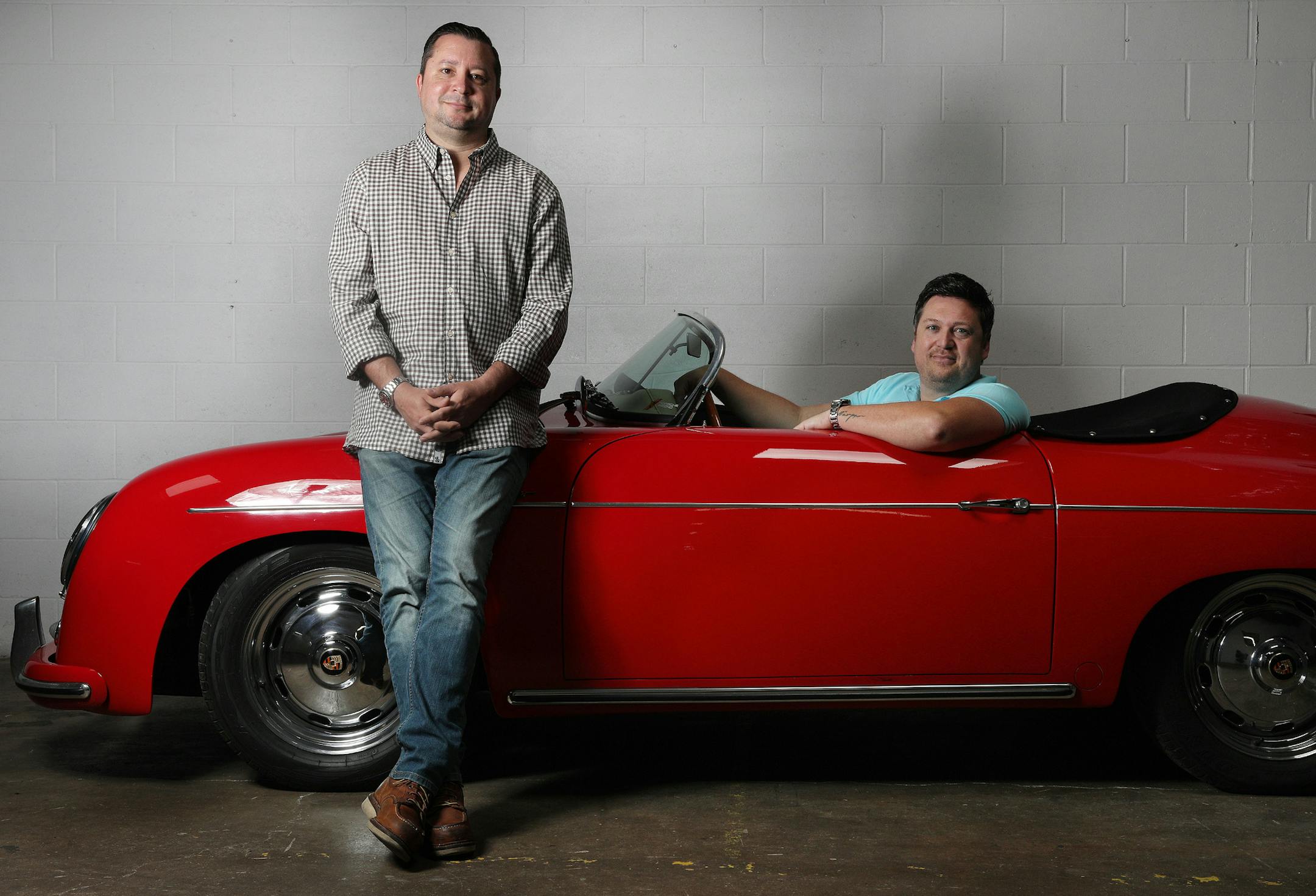 Luis Fraguada, left, and Tyler Christopherson posed for a portrait with a 1957 Porsche Speedster Tribute Wednesday, May 17, 2017n at Morrie's Heritage Car Connection in Golden Valley, Minn. ] ANTHONY SOUFFLE ï anthony.souffle@startribune.com A popular monthly car show in Chanhassen has outgrown its venue at the city's AutoMotorPlex, prompting officials to cancel this month's event due to traffic issues and safety concerns. Cars and Coffee organizers say they've struck a deal to continue the