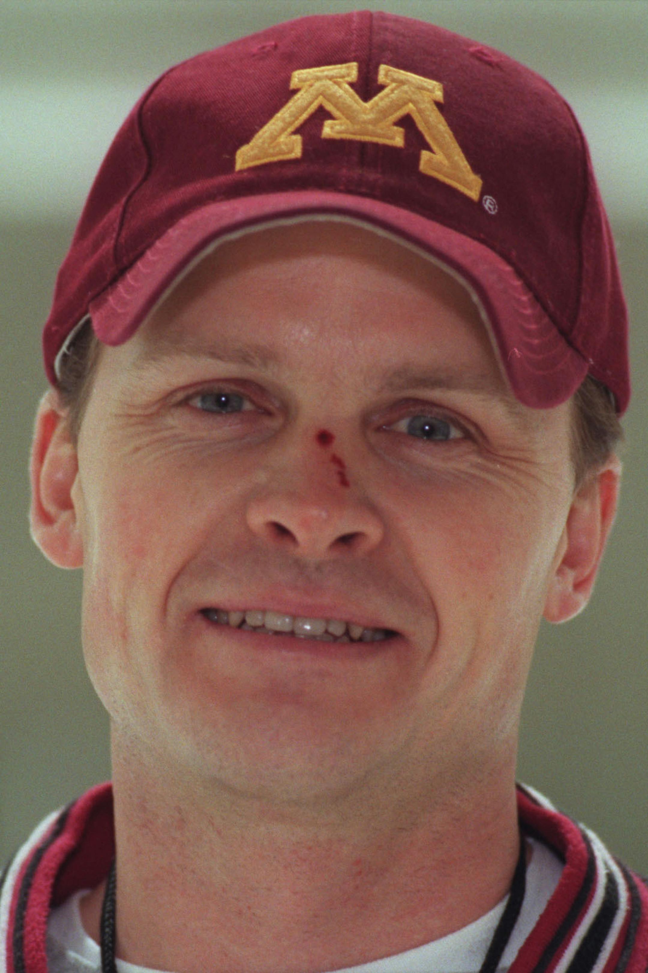 South St. Paul girl&#xed;s hockey--coach Dave Palmquist, goalie Sarah Ahlquist, defenseman Ashley Albrecht. -- South St. Paul girls hockey coach Dave Palmquist.