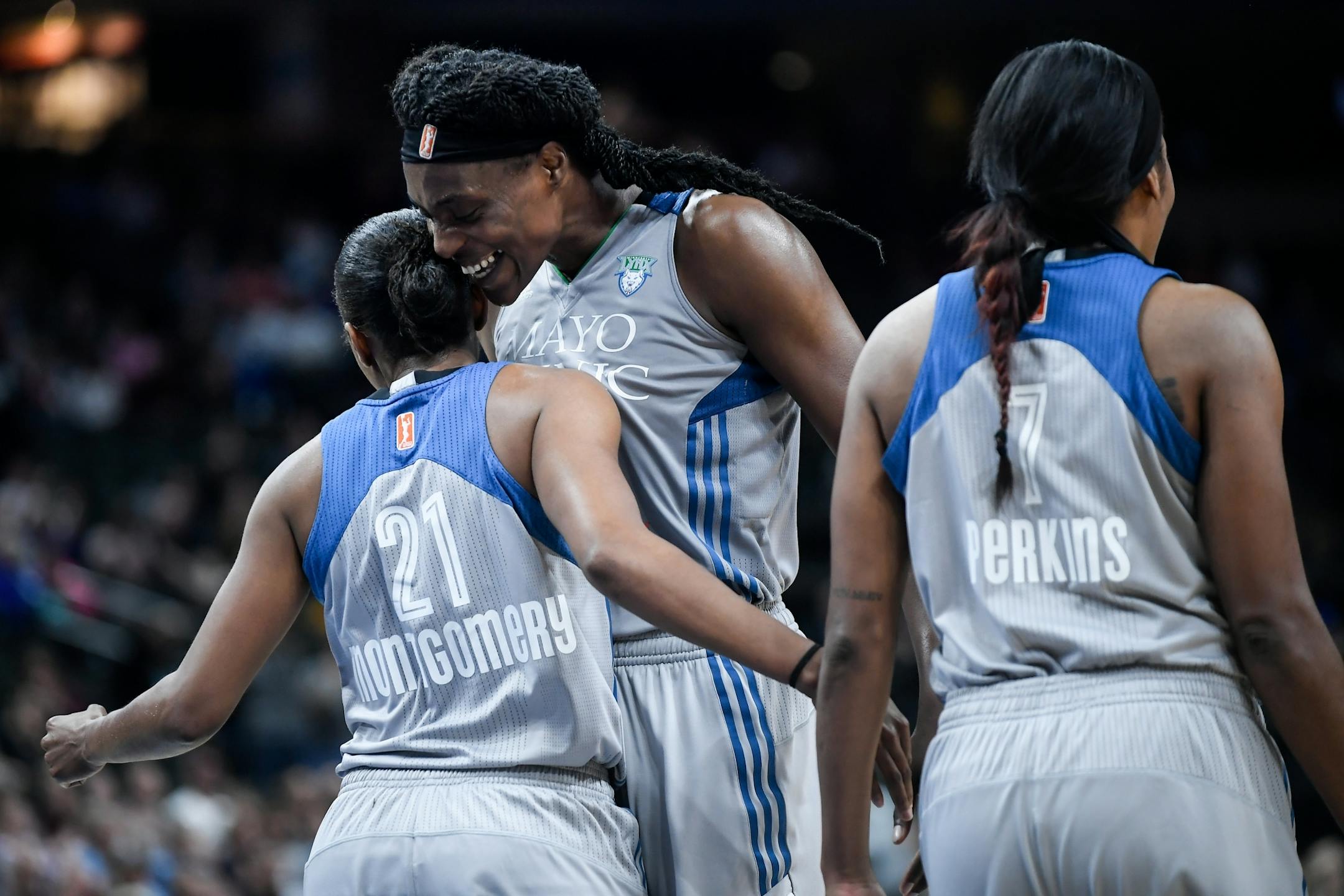 Minnesota Lynx center Sylvia Fowles (34) bumped chests with guard Renee Montgomery (21) after an and-one opportunity created by Montgomery in the fourth quarter Thursday against the Atlanta Dream.