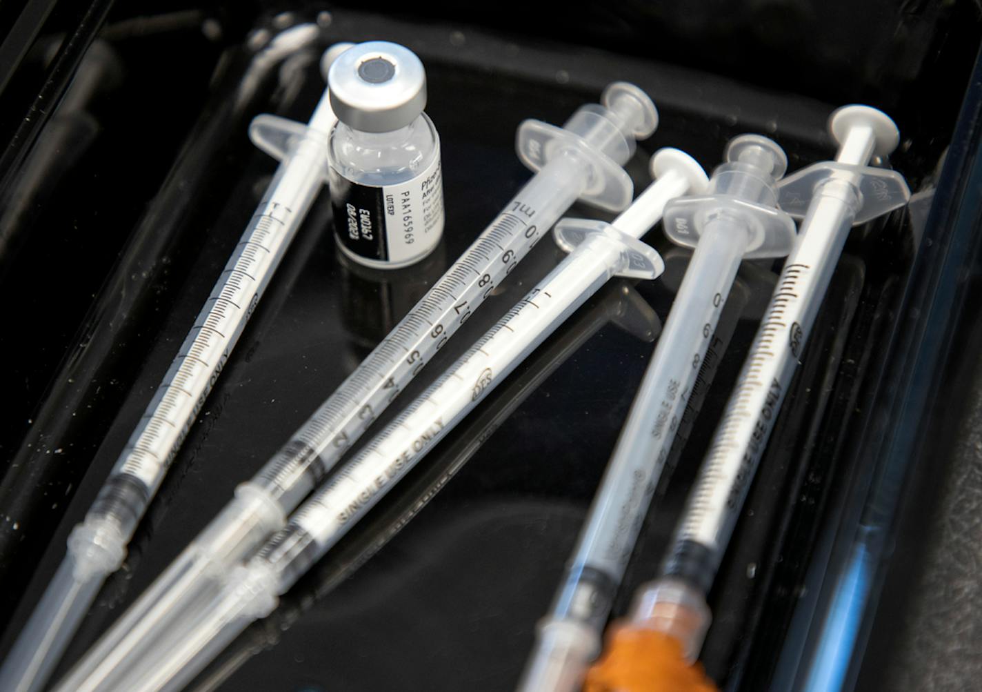 Pfizer vaccine and syringes at the St. Paul Eastside YMCA. Governor Tim Walz and the YMCA of the North announced a series of free COVID-19 vaccine clinics at YMCA locations across the Greater Twin Cities area.