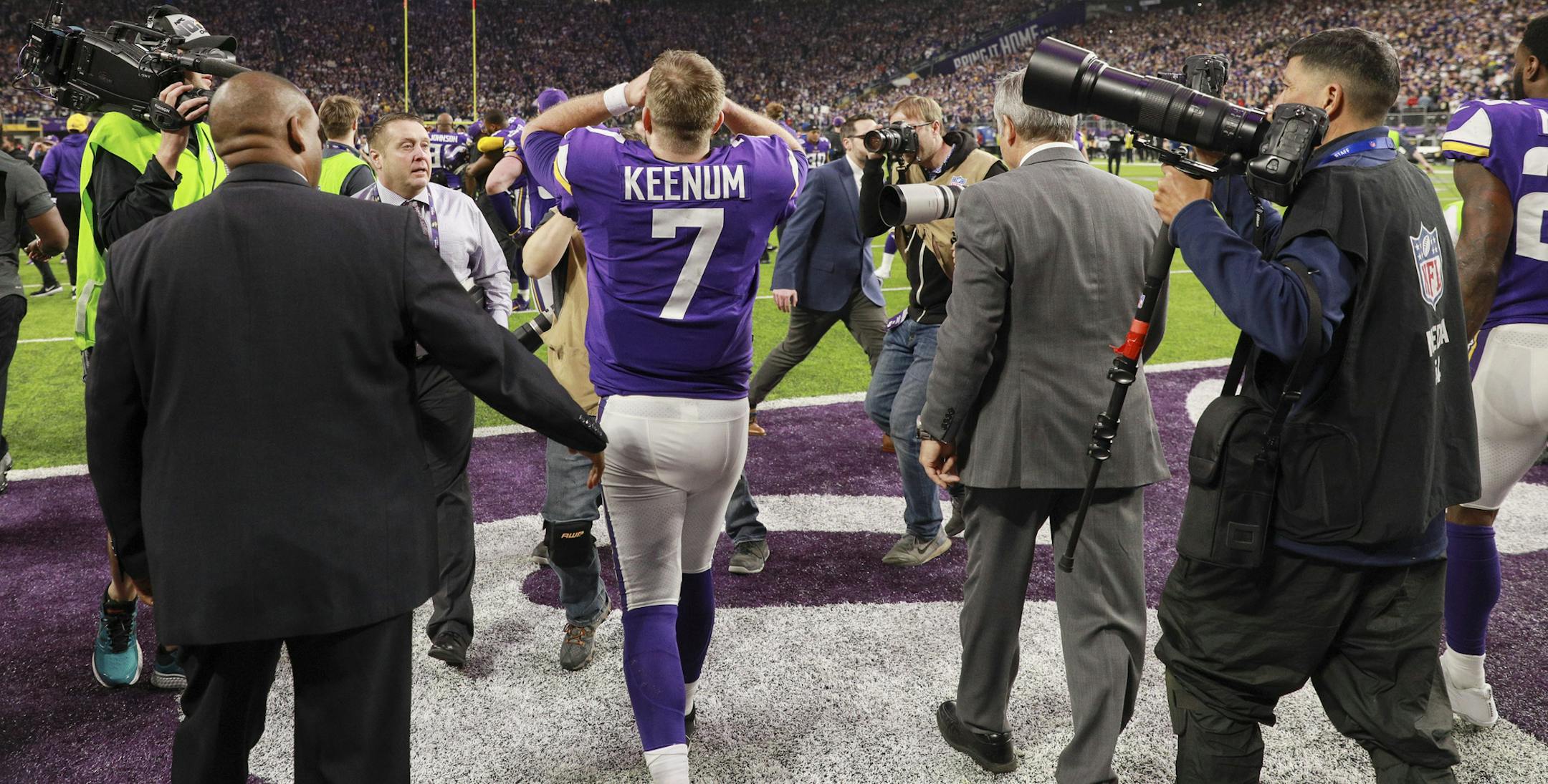 Vikings quarterback Case Keenum walks off the field in disbelief after Stephon Diggs caught his pass to score a game winning TD as time ran out. ] BRIAN PETERSON • brian.peterson@startribune.com The Minnesota Vikings faced the New Orleans Saints in an NFL divisional playoff game Sunday afternoon, January 14, 2018 at U.S. Bank Stadium in Minneapolis.