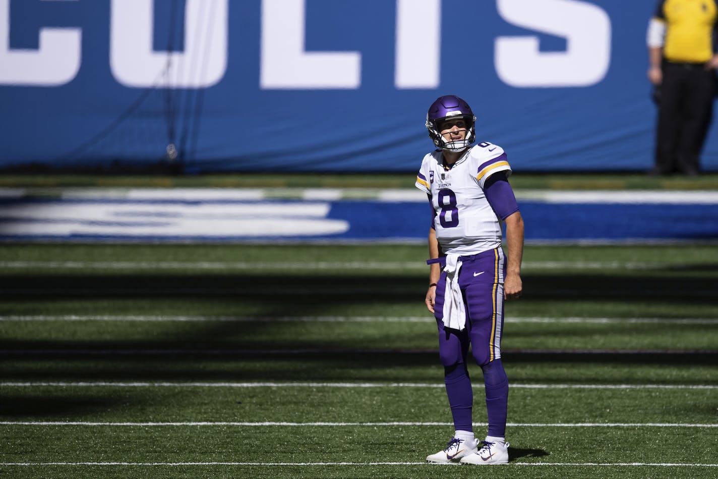 Minnesota Vikings quarterback Kirk Cousins (8) looks up at a replay on the scoreboard during an NFL football game between the Indianapolis Colts and Minnesota Vikings, Sunday, Sept. 20, 2020, in Indianapolis. (AP Photo/Zach Bolinger)