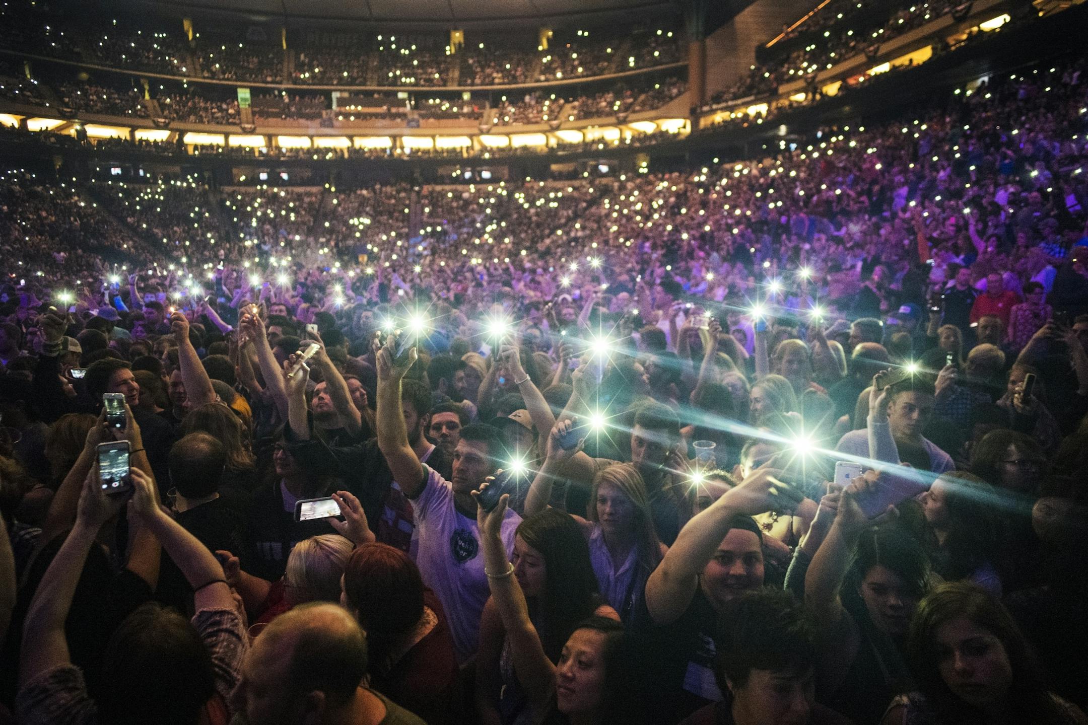 Before Mumford & Sons performed at a nearly sold-out show, the crowd danced to Purple Rain in Prince's honor. The crowd was also bathed in purple light.