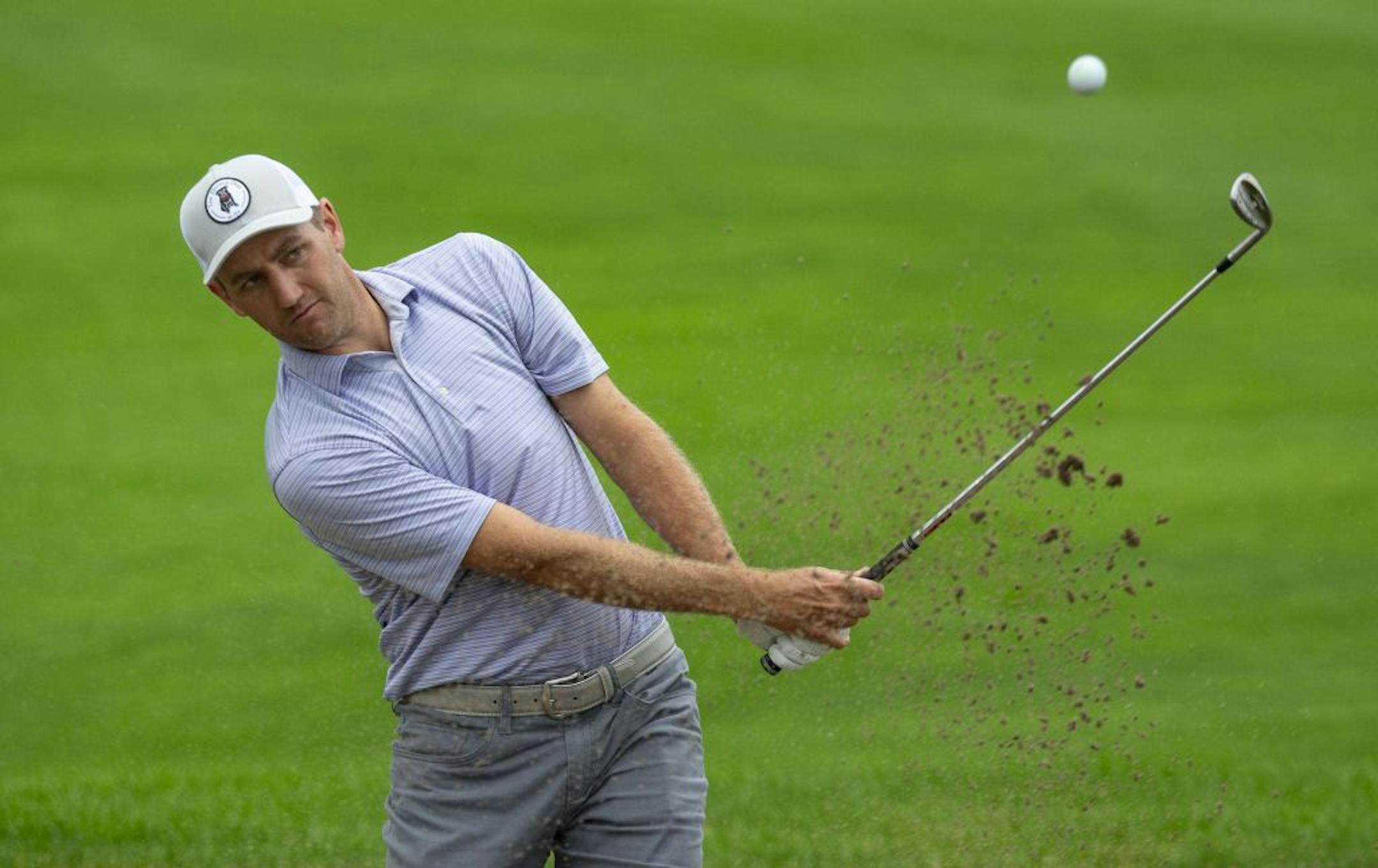 Brendon Todd chips a ball out of the bunker on the eighteenth hole on Monday. ALEX KORMANN ¥ alex.kormann@startribune.com A Monday qualifying round round of golf was held at Victory Links course on Monday July 1, 2019 to determine who would make the cut for the 3M open to be held this week. Many hopefuls played their hearts out in an effort to earn one of four spots up for grabs in the PGA Tour event.