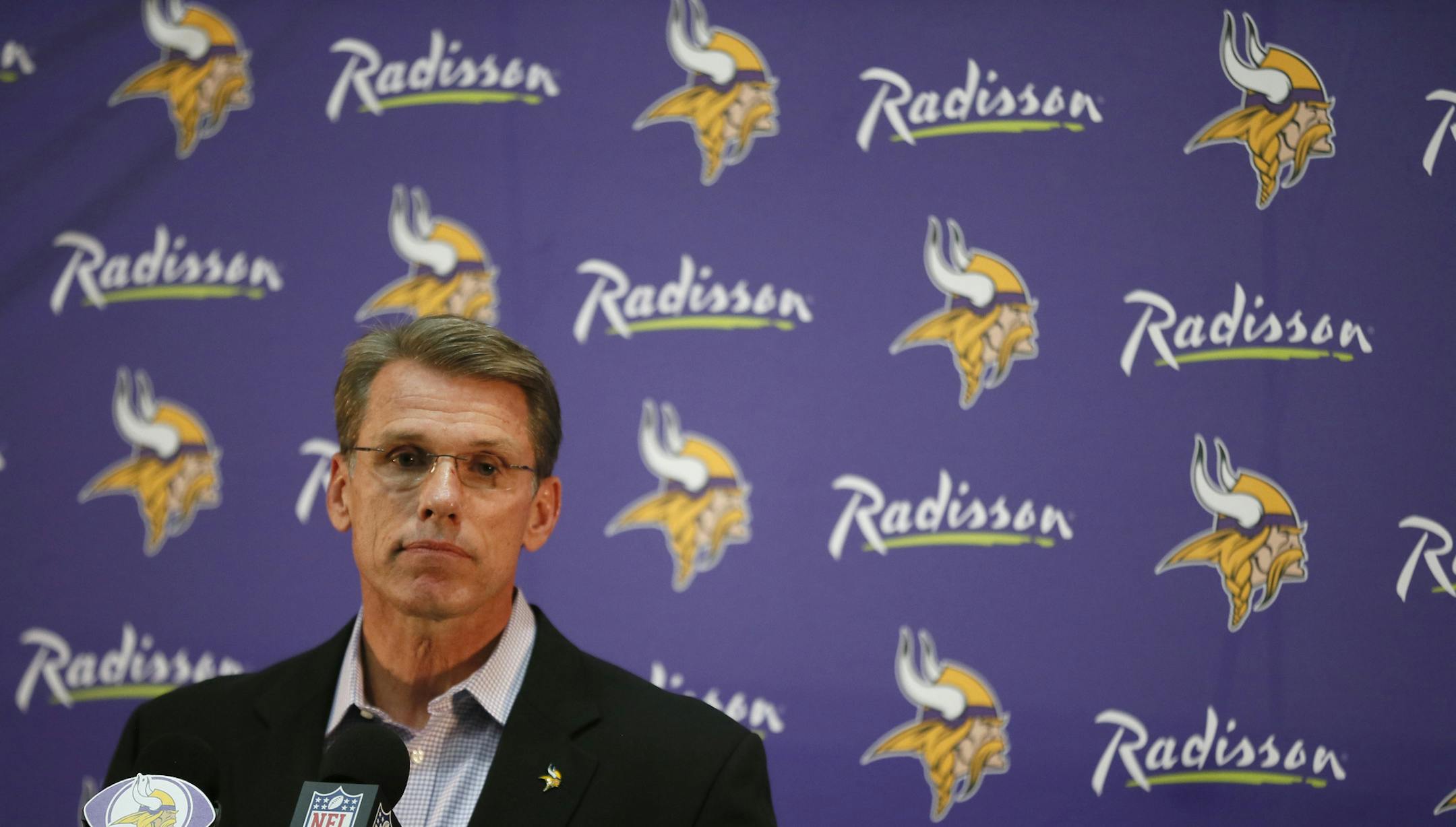 Minnesota Vikings general manger Rick Spielman listens to reporters after discussing the descision to allow Adrian Peterson to play on Sunday against the New Orleans Saints, Monday, Sept. 15 , 2014. in Eden Prairie, Minn. The Vikings had benched Peterson after news broke Friday that he had used a wooden switch to spank his 4-year-old son, causing unspecified injuries (AP Photo/The Star Tribune, Jerry Holt) MANDATORY CREDIT; ST. PAUL PIONEER PRESS OUT; MAGS OUT; TWIN CITIES TV OUT ORG XMIT: MIN20