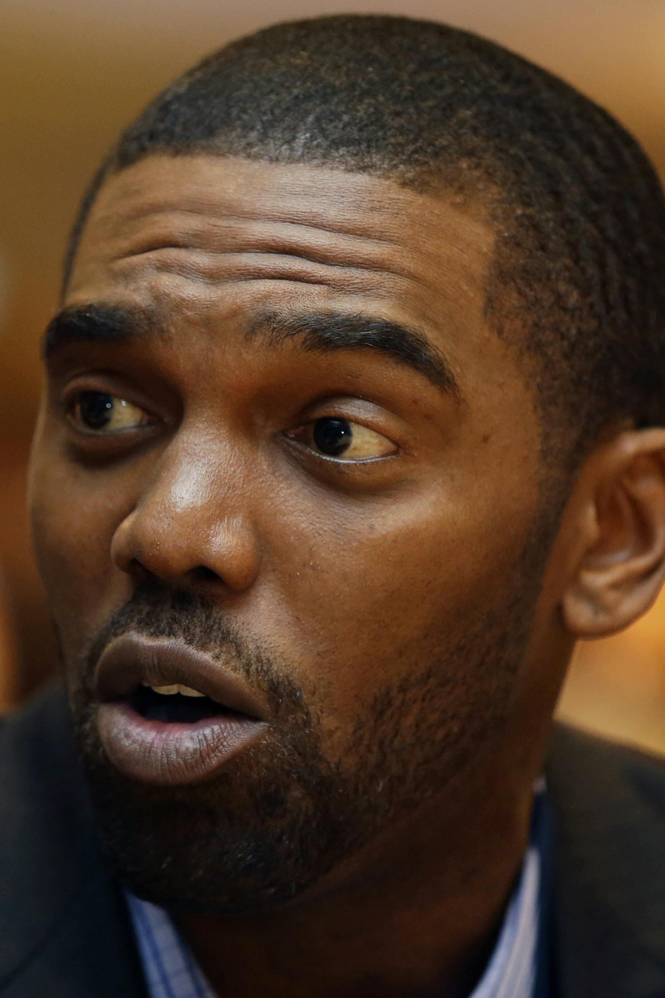 Randy Moss speaks during an interview at the NFL Super Bowl XLVIII media center, Tuesday, Jan. 28, 2014, in New York. (AP Photo/Matt Slocum) ORG XMIT: OTKMS251