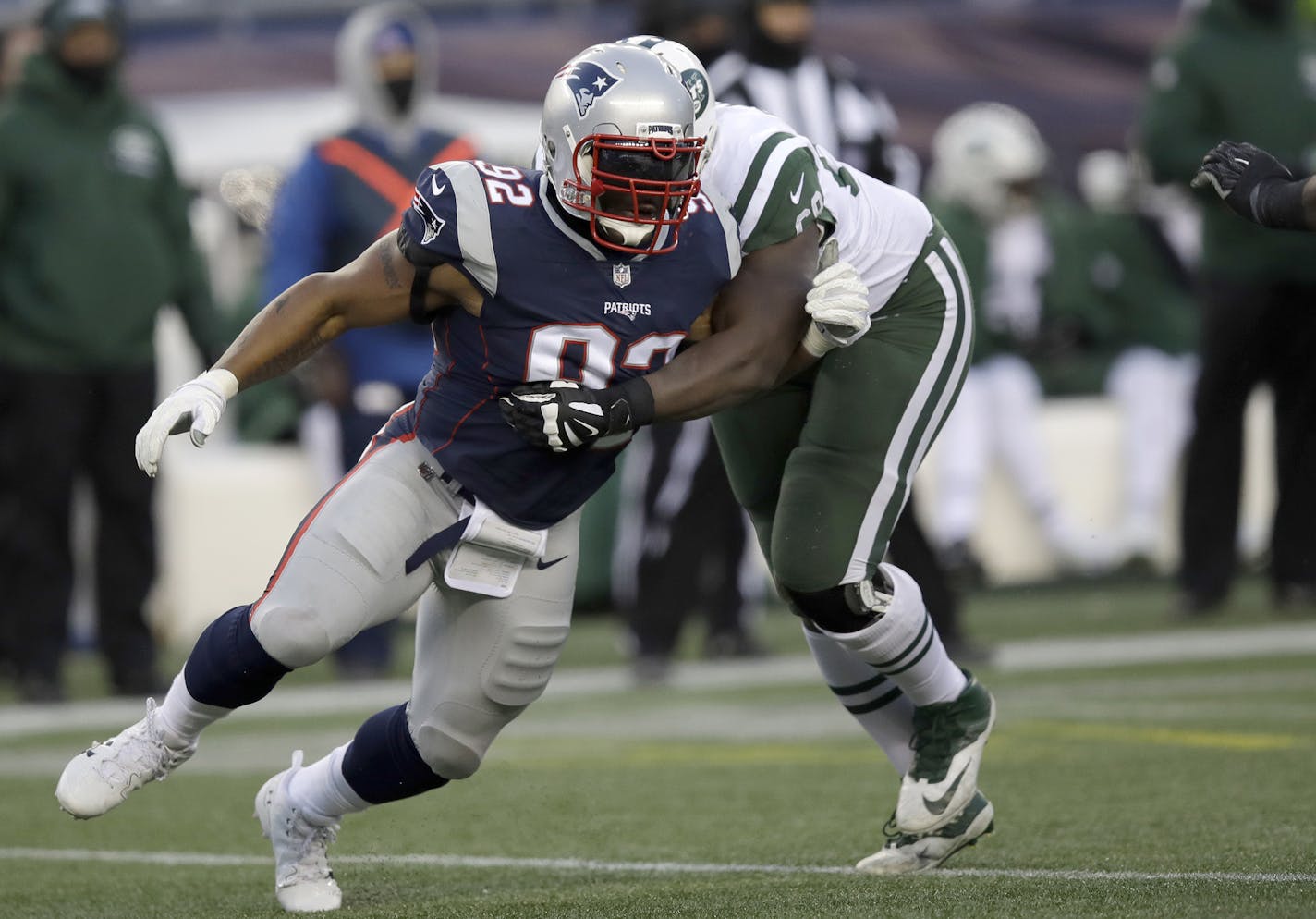 FILE - In this Dec. 31, 2017 file photo, New England Patriots linebacker James Harrison, left, slips a block by New York Jets tackle Kelvin Beachum as he heads toward a sack of Jets quarterback Bryce Petty during the second half of an NFL football game in Foxborough, Mass. Harrison has six tackles and a quarterback hit in the Patriots' two postseason wins. (AP Photo/Charles Krupa, File)