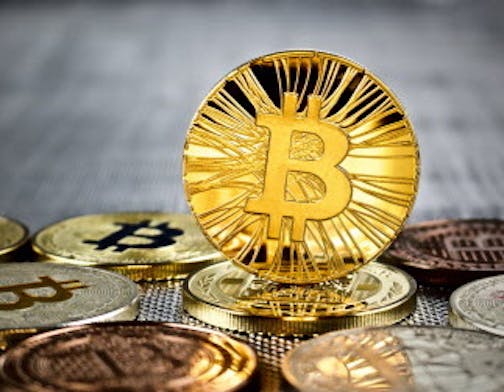 Joshua Brown recently bought his first Bitcoin, a digital currency. (Dreamstime) ORG XMIT: 1215058