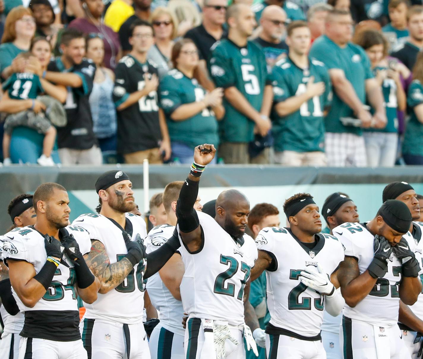 Philadelphia Eagles strong safety Malcolm Jenkins raises his fist during the national anthem before the Eagles play the Miami Dolphins in a preseason game on Thursday, Aug. 24, 2017, at Lincoln Financial Field in Philadelphia. (David Maialetti/Philadelphia Inquirer/TNS) ORG XMIT: 1217264