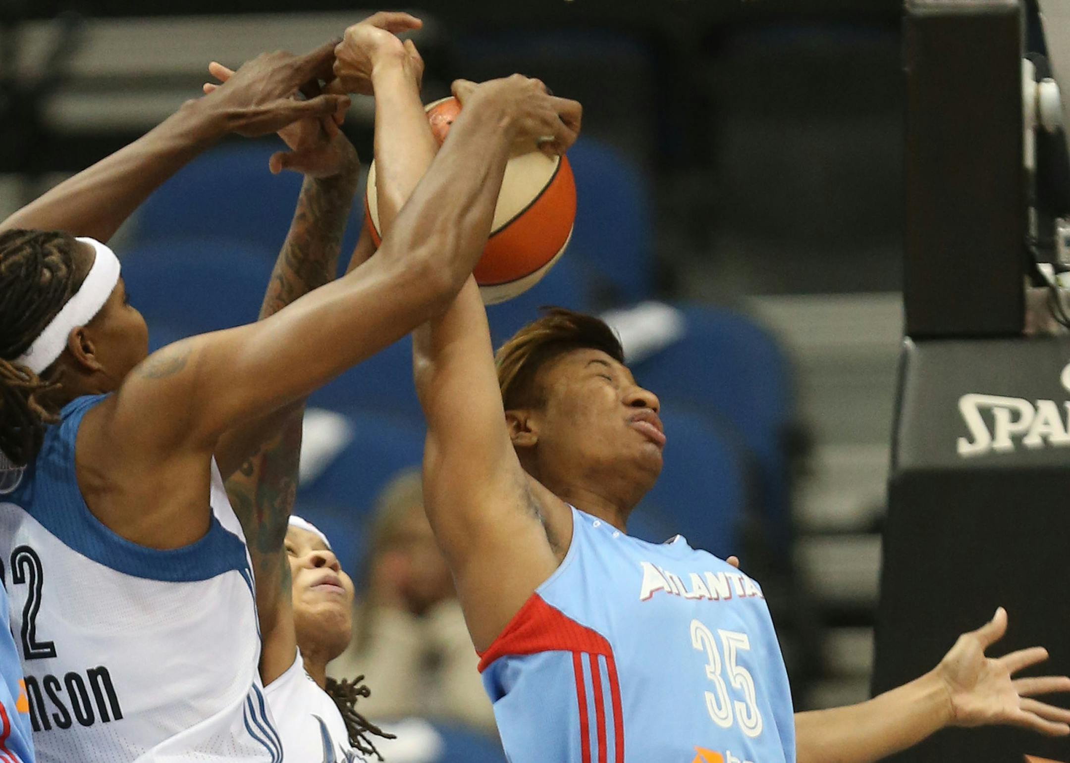 Rebekkah Brunson #32 of the Minnesota Lynx blocked the shot of Angel McCoughtry #35 of the Atlanta Dream during the first quarter of Game 2 of the WNBA Finals at Target Center in Minneapolis, Min., Tuesday, October 8, 2013 ] (KYNDELL HARKNESS/STAR TRIBUNE) kyndell.harkness@startribune.com