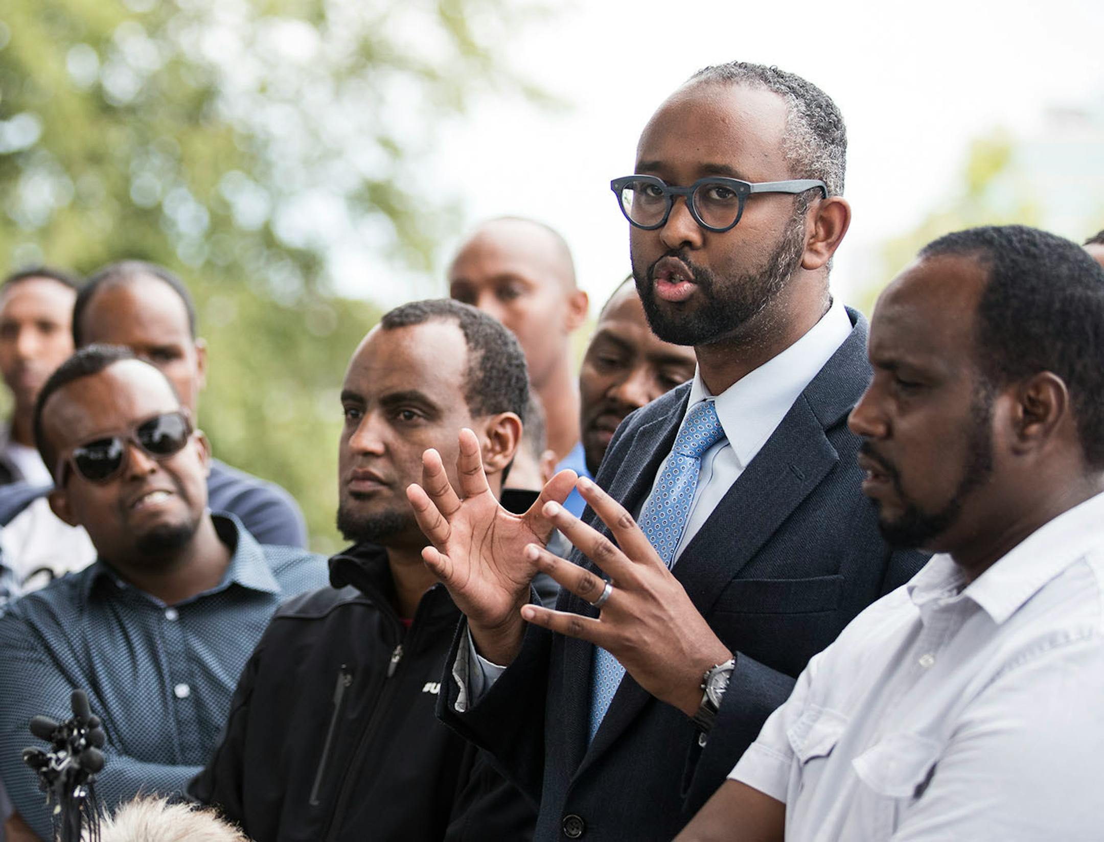 Jaylani Hussein, the executive director of CAIR-MN speaks during a press conference.