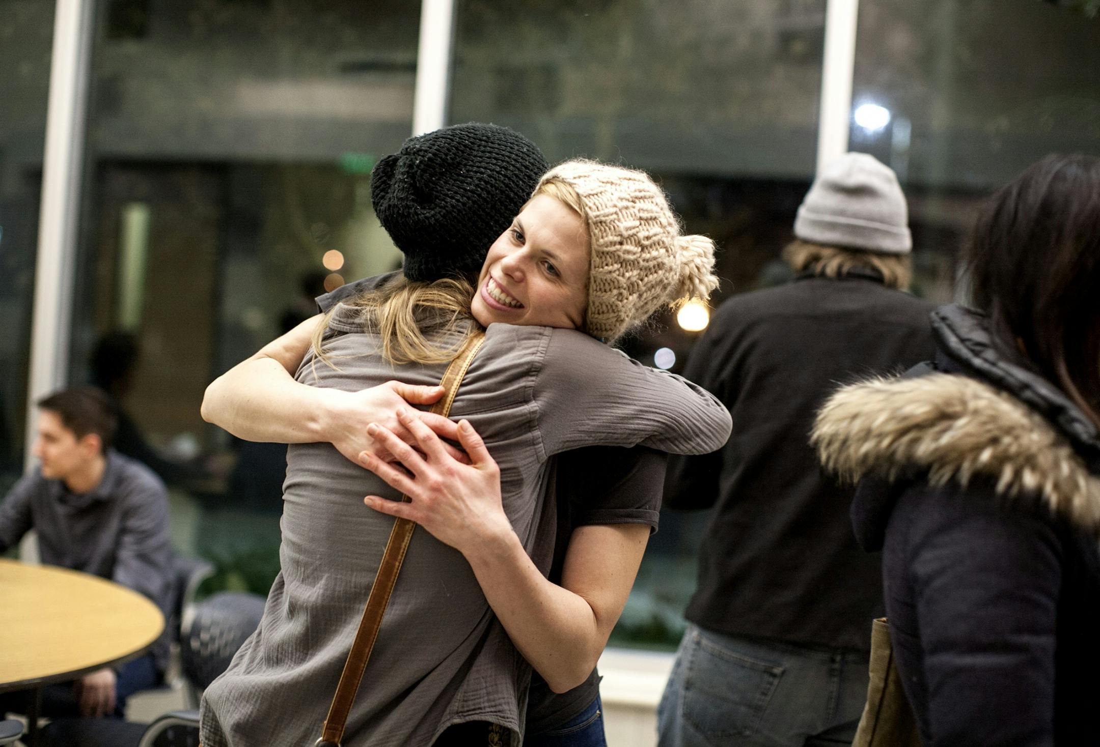Founder Emily Torgrimson visits with guests at Eat for Equity's community feast benefitting Urban Ventures at the Urban Ventures headquarters in Minneapolis January 31, 2015.