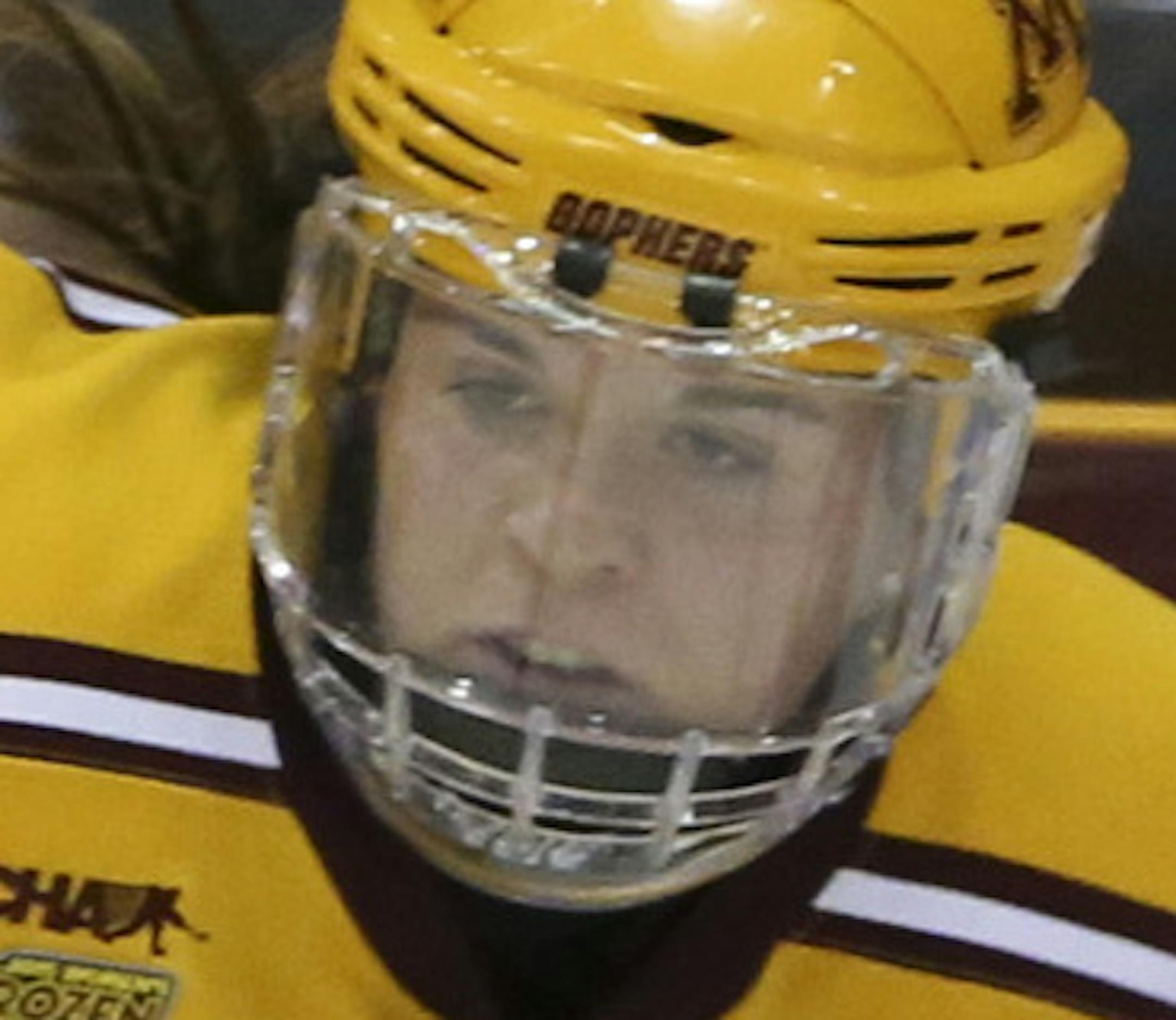 Minnesota center Hannah Brandt (22) shoved Harvard defender Michelle Picard (20) off the puck in the second period Sunday afternoon at Ridder Arena. ] JEFF WHEELER ï jeff.wheeler@startribune.com The University of Minnesota women's hockey team faced Harvard in the NCAA Women's Frozen Four Championship game Sunday afternoon, March 22, 2015 at Ridder Arena in Minneapolis.