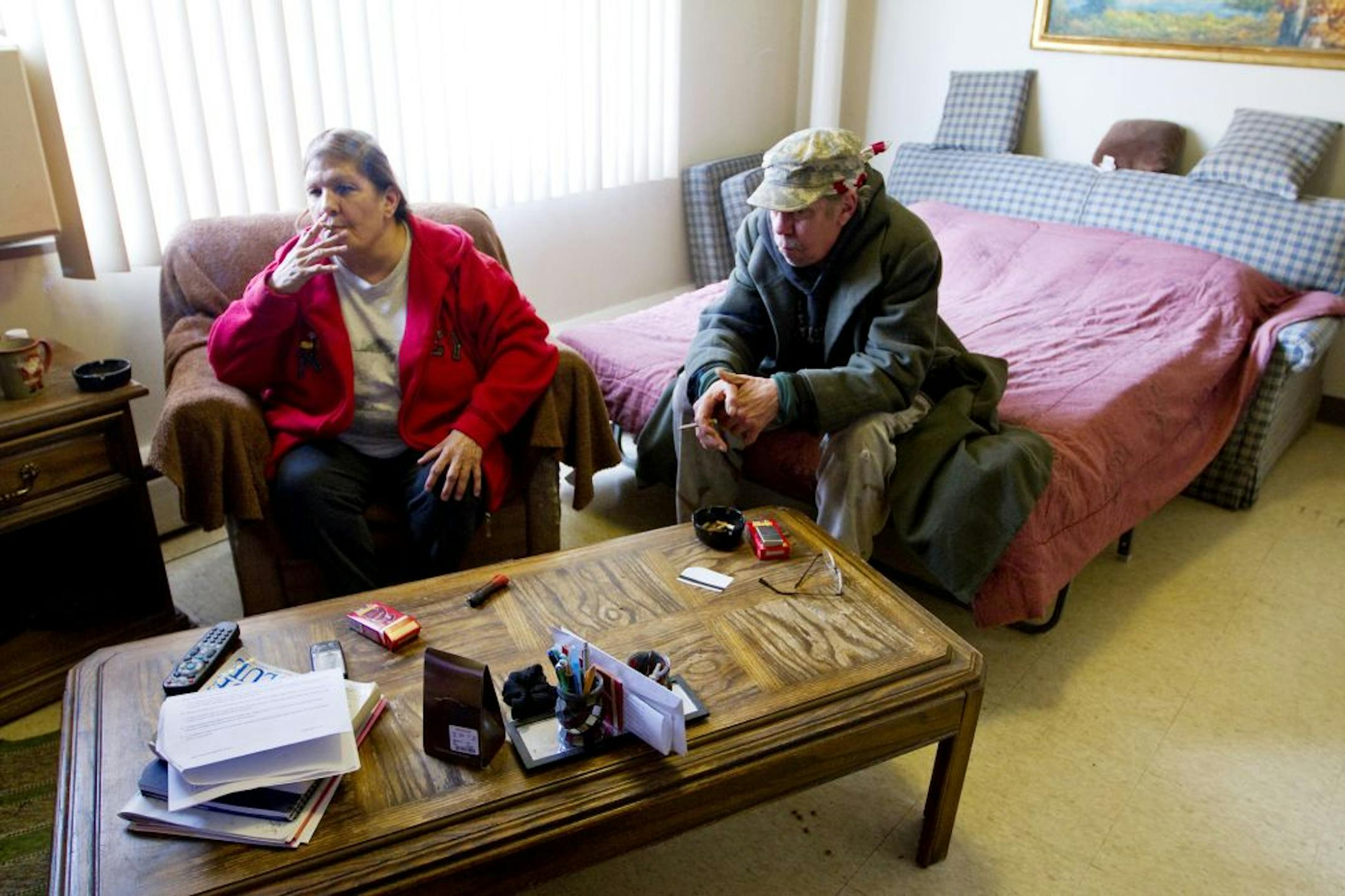 Mary McGovern and her husband, Jeff, are accustomed to smoking in her efficiency apartment near downtown Minneapolis. That will have to change when a ban covering the city's 5,000 public housing units is phased in.