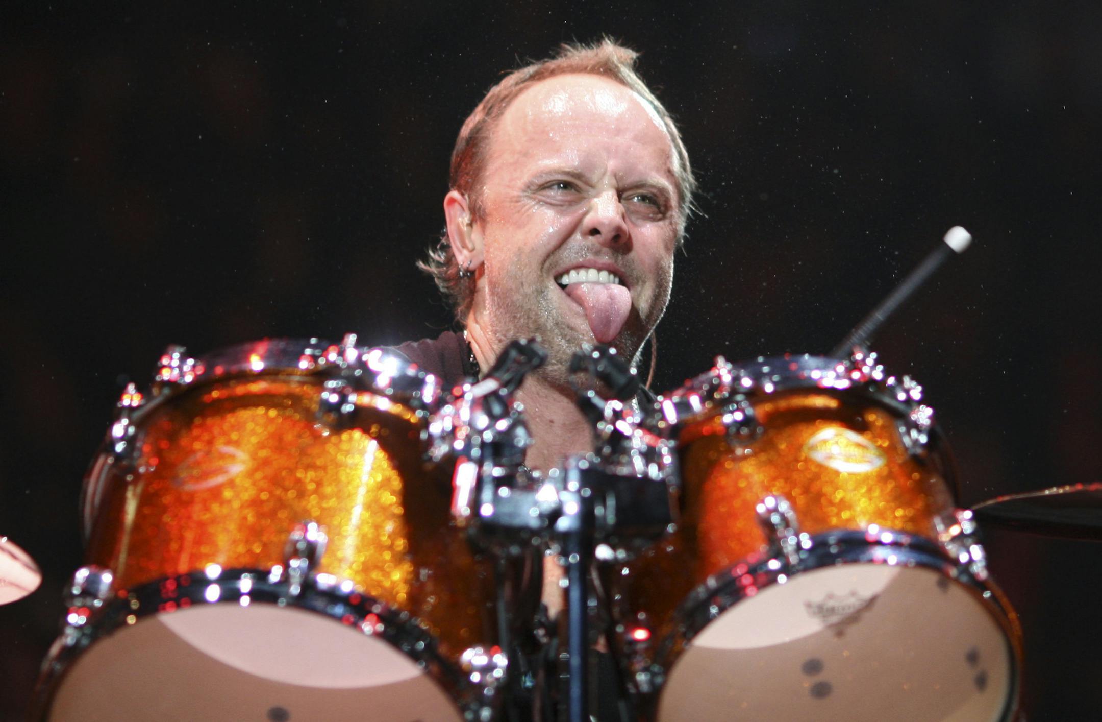 JEFF WHEELER ¬• jwheeler@startribune.com MINNEAPOLIS - 10/13/09 - Metallica performed at Target Center in Minneapolis Tuesday night while on tour in support of their "Death Magnetic" album. IN THIS PHOTO: ] Metallica drummer Lars Ulrich pounded his kit early in the band's show at Target Center Tuesday night. ORG XMIT: MIN2013092512403344