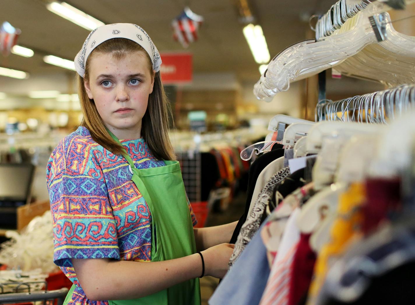 Lacey Athey, 19, is a senior at St. Anthony Village High School, who has struggled in school with severe attention deficit hyperactivity disorder (ADHD) and speech delays. However, Athey is ambitious, and wants to live and work on her own without any assistance. Here, Athey landed a job in April at Unique Thrift Store in Columbia Heights, where she sorted through racks of recycled clothing Thursday, May 31, 2018, at work in Columbia Heights, MN.] DAVID JOLES &#xef; david.joles@startribune.com In