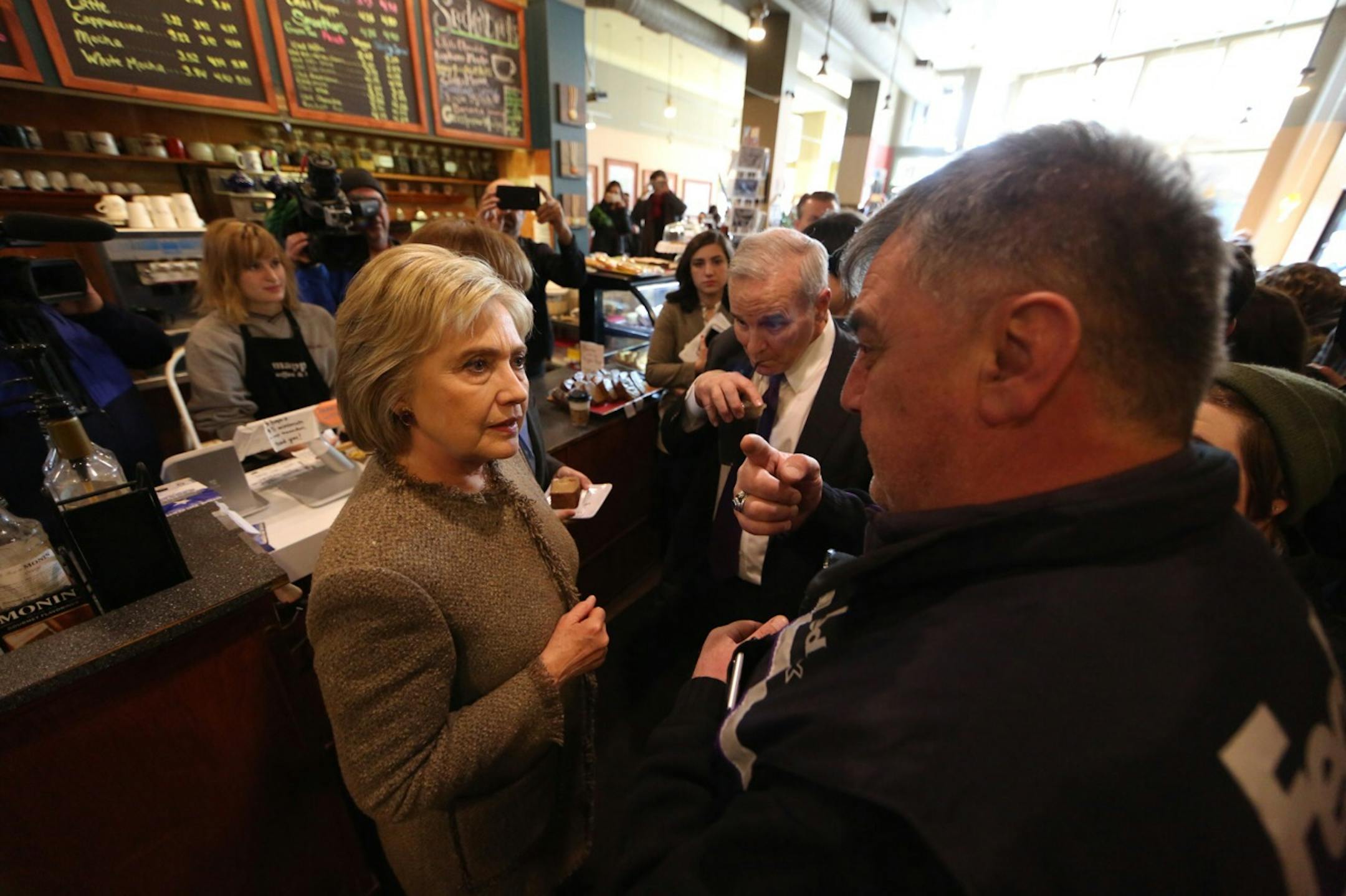 Hillary Clinton greeted supporters at Mapps Coffee Shop in the Cedar-Riverside neighborhood of Minneapolis on her first Twin Cities stop Tuesday.
