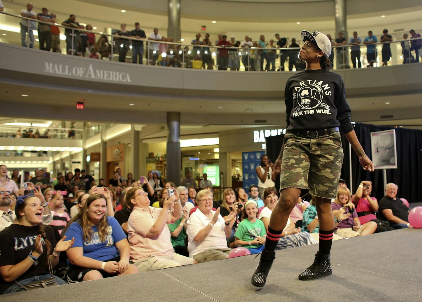 Seimone Augustus strutted down the catwalk during the Catwalk four a Cure in 2012.