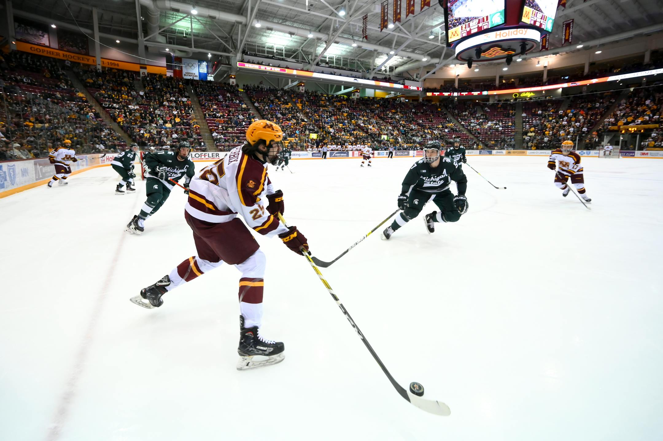 Gophers forward Jack Perbix controlled the puck in the second period against Michigan State during Friday night's game.