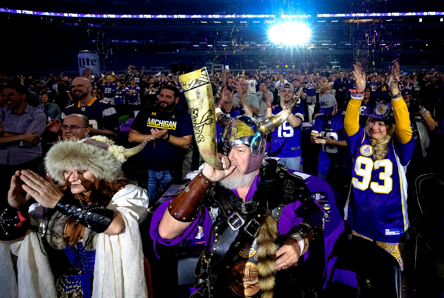 Teri "Freyja" Hanson and Greg "Sir Odin" Hanson of Watkins, MN cheered after the Vikings selected Central Florida CB Mike Hughes in the first round