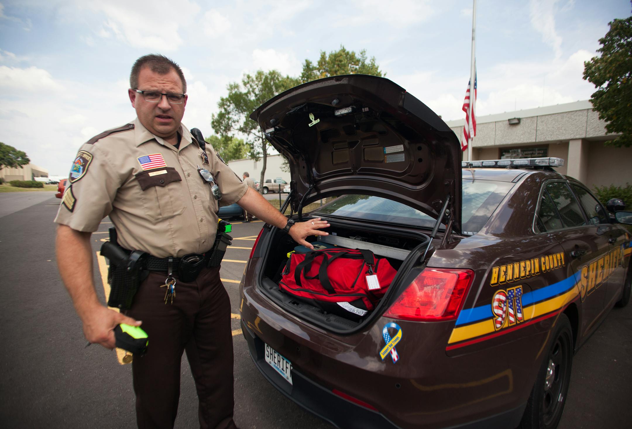 Sergeant Matther Steffens leaves his first aid kit in the trunk and keeps the Narcan kit with him in the car. "Narcan need to be in a cooler temperature," He explained. The Star Tribune, Shelly Yang