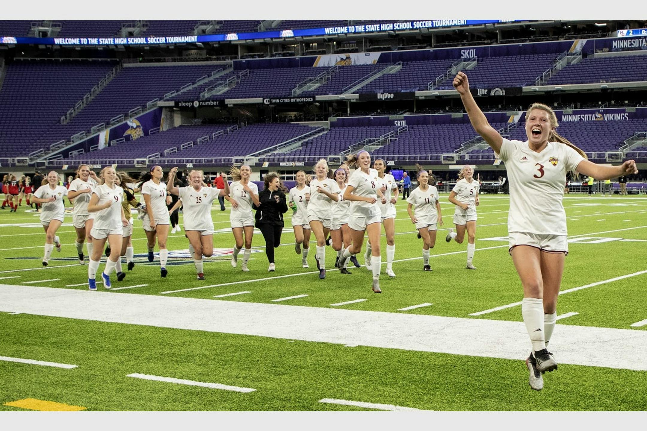 Maple Grove celebrated winning the 2A girls' tournament in 2019.
