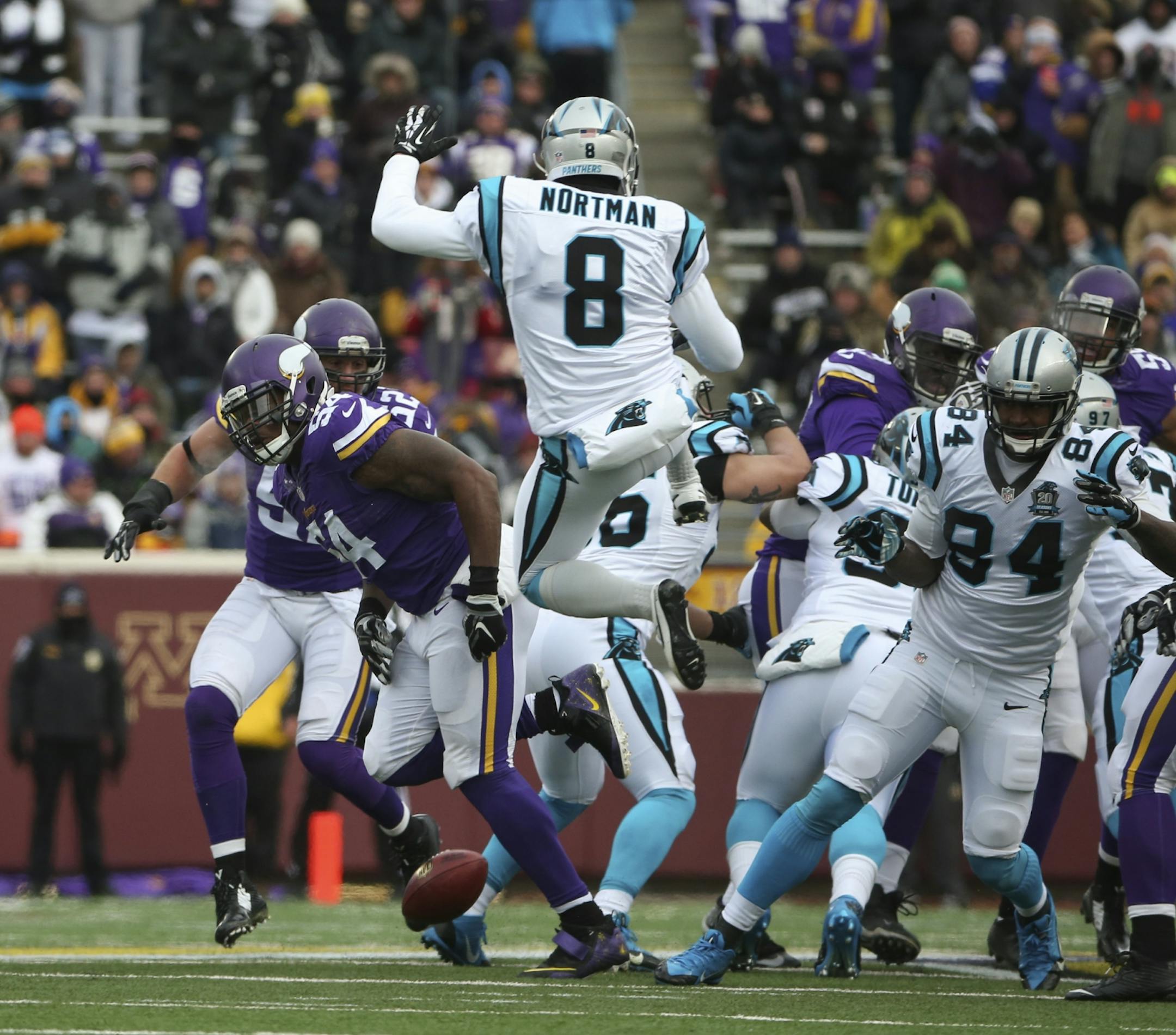 Vikings middle linebacker Jasper Brinkley (54) blocked a second quarter punt by Panthers punter Brad Nortman (8). Teammate Minnesota Vikings defensive end Everson Griffen recovered the ball and ran 43 yards for the Vikings second blocked kick touchdown of the game Sunday afternoon.