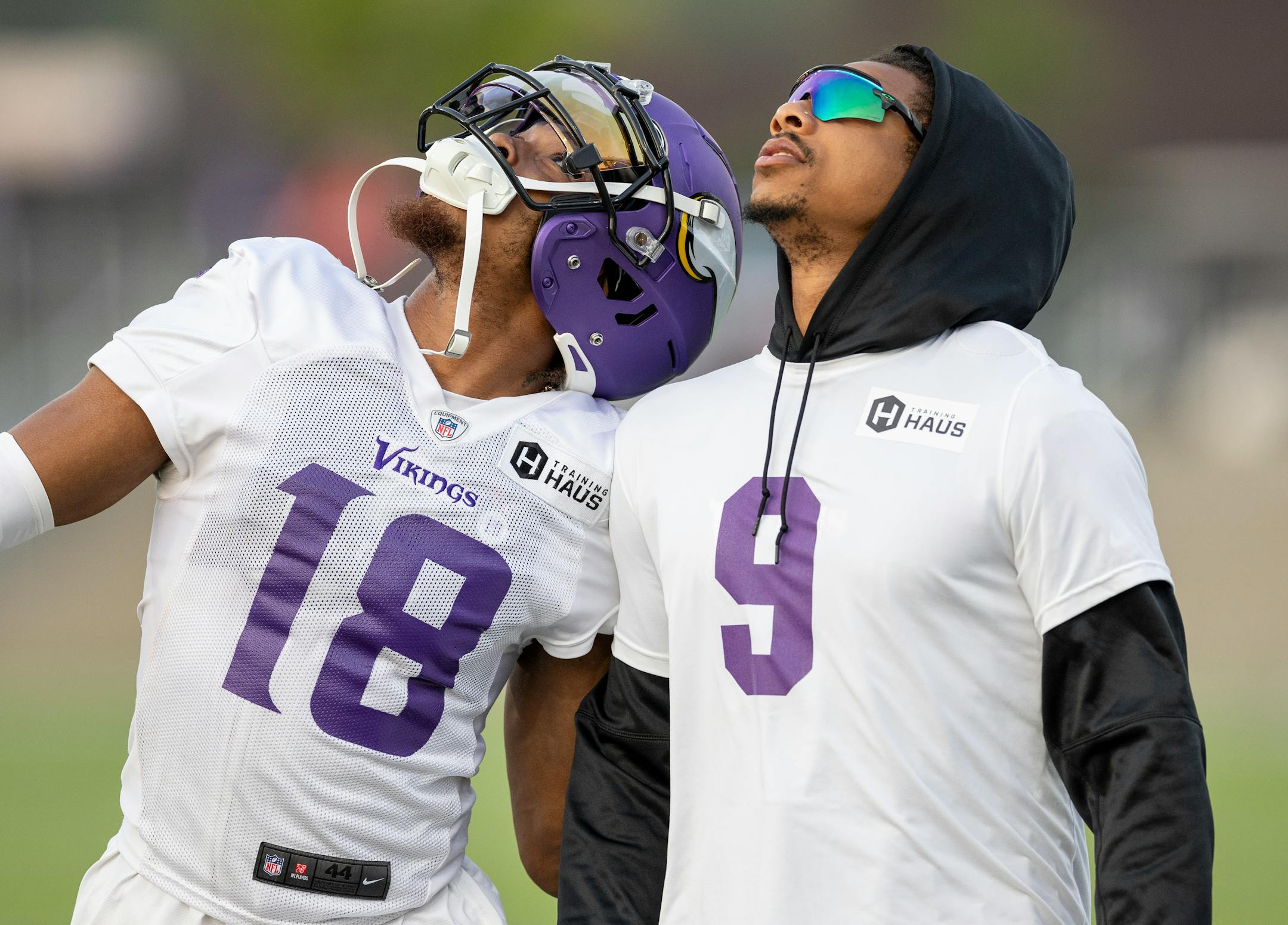 Minnesota Vikings receivers Justin Jefferson (18) and Trishton Jackson (9) during evening practice Tuesday, August 8, 2023, at TCO Stadium in Eagan, Minn.