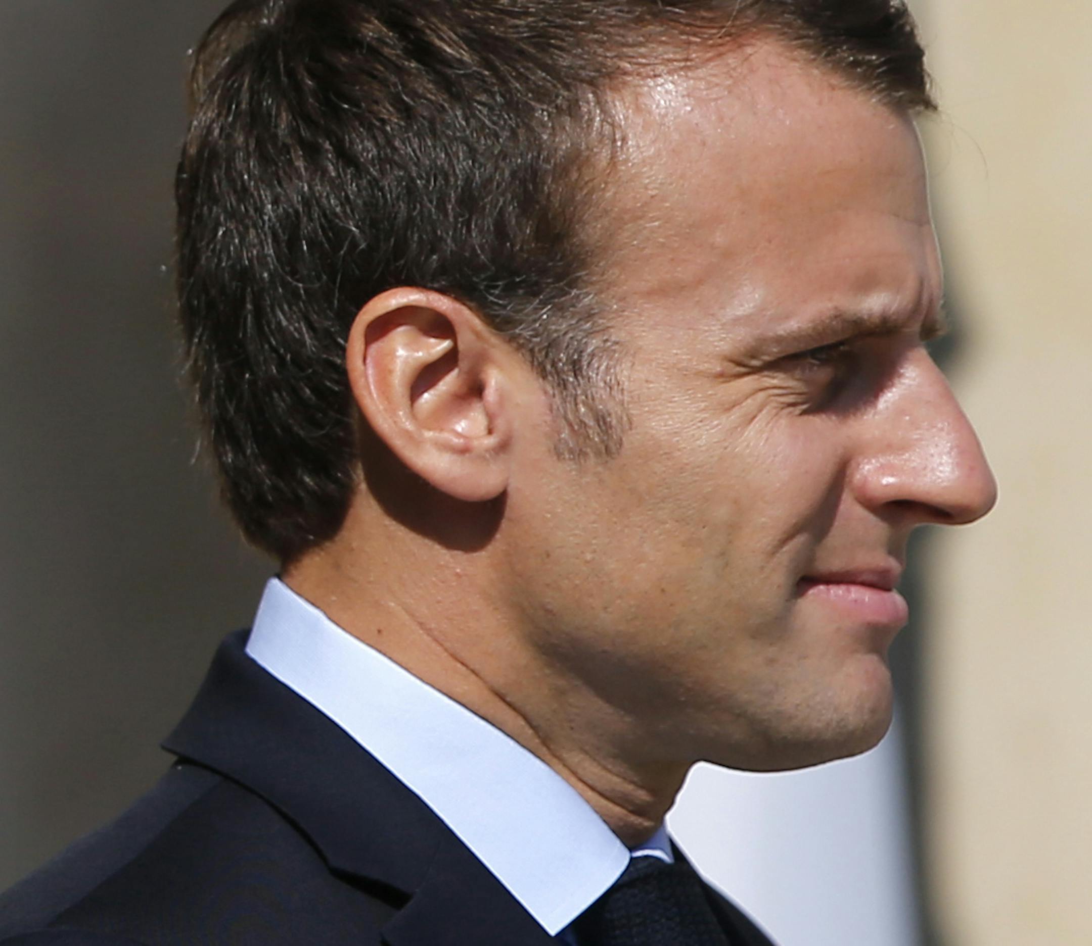 France President Emmanuel Macron waits Czech Prime Minister Andrej Babis prior to a meeting, at the Elysee Palace, in Paris, Saturday, June 30, 2018. (AP Photo/Thibault Camus)