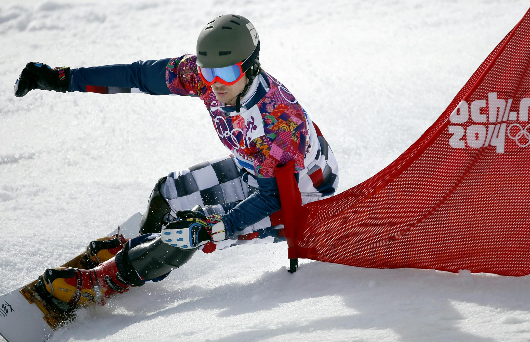 Vic Wild of Russia during a run at Rosa Khutor Extreme Park. Wild won the gold medal in the men's parallel slalom on Saturday. ] CARLOS GONZALEZ cgonzalez@startribune.com - February 22, 2013, Sochi, Russia, Sochi 2014 Winter Olympics, Rosa Khutor Extreme Park, Snowboarding Parallel Slalom
