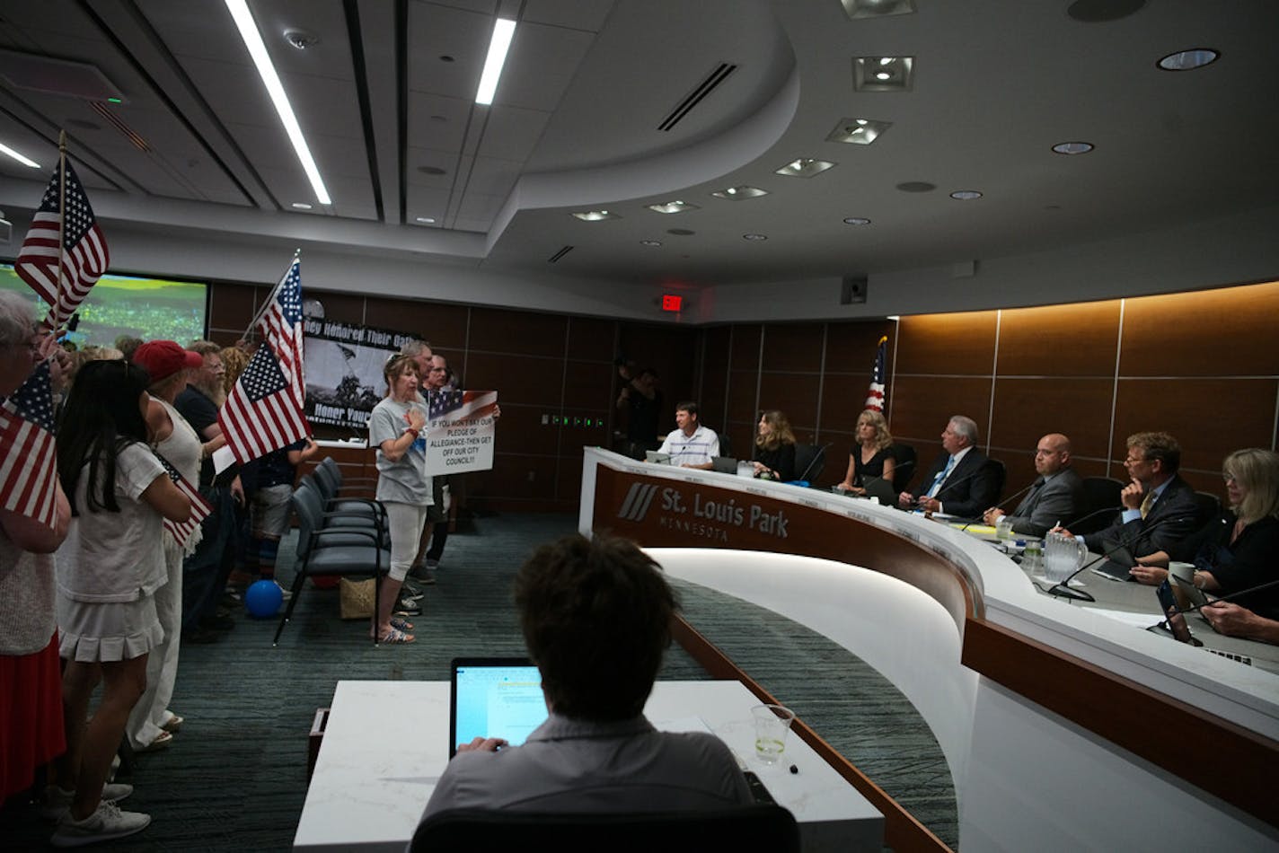 More than 100 people packed a St. Louis Park City Council session as the Pledge of Allegiance debate raged.