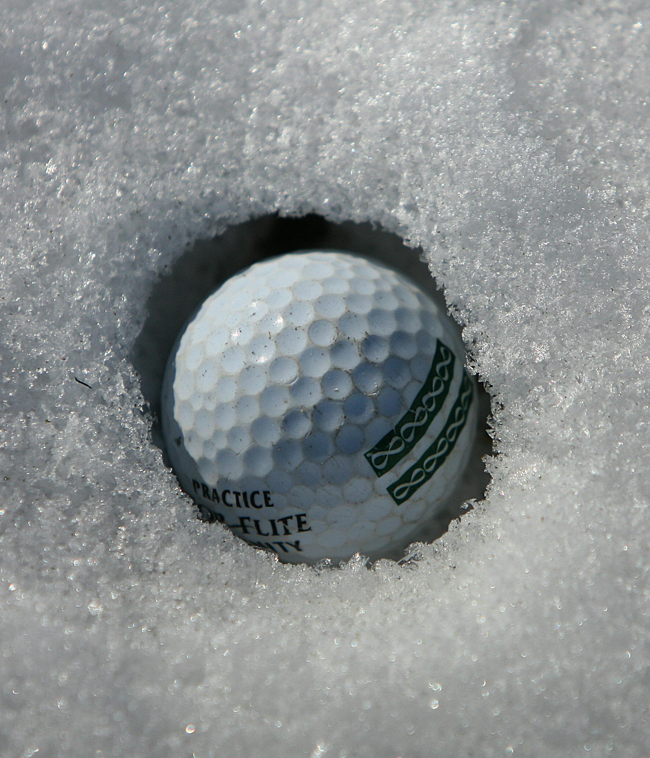 JIM GEHRZ &#x2022; jgehrz@startribune.com
Lake Elmo/February 17, 2007/12:30PM
Despite frigid, winter temperatures, golf enthusiasts are able to practice their swings at the Country Air Golf Park in Lake Elmo. Golfers are protected from the elements by a heated, wooden hut that opens to a driving range. Golf balls land in the snow and are sometimes buried.