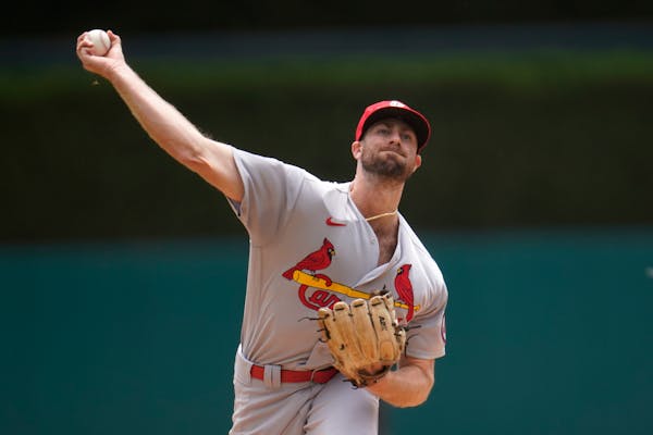 St. Louis Cardinals pitcher John Gant throws against the Detroit Tigers in the first inning of a baseball game in Detroit, Wednesday, June 23, 2021. (