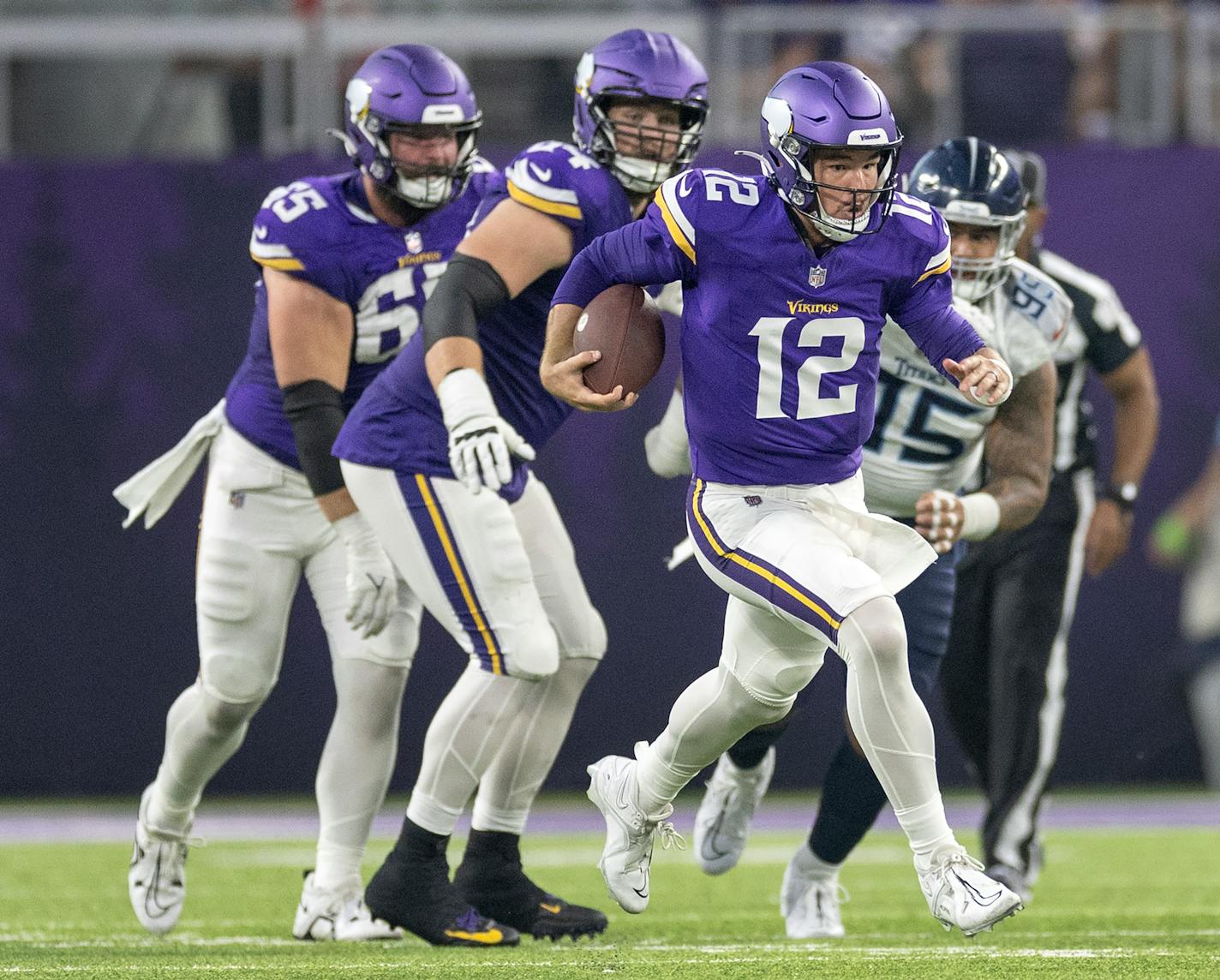 Minnesota Vikings quarterback Nick Mullens (12) scrambles in the second quarter Saturday, August 19, 2023, U.S. Bank Stadium in Minneapolis, Minn. ] CARLOS GONZALEZ • carlos.gonzalez@startribune.com