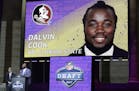 Former Minnesota Vikings player John Randle, right, announces Florida State's Dalvin Cook as the Vikings selection in the second round of the 2017 NFL