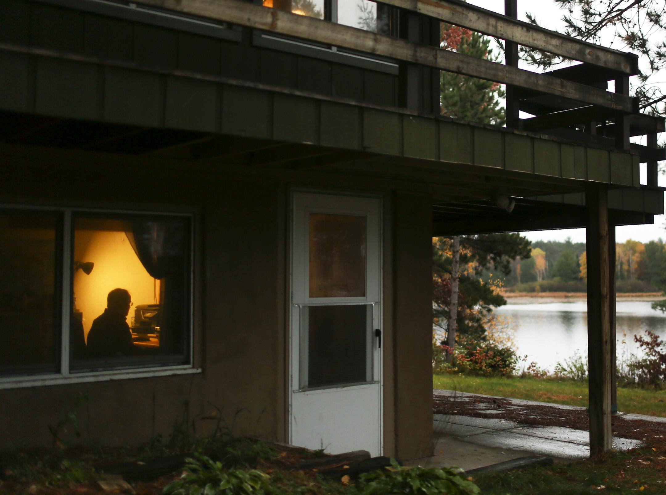 Al Cambronne, author of "Deerland," writes at his home office in Solon Springs, Wis.